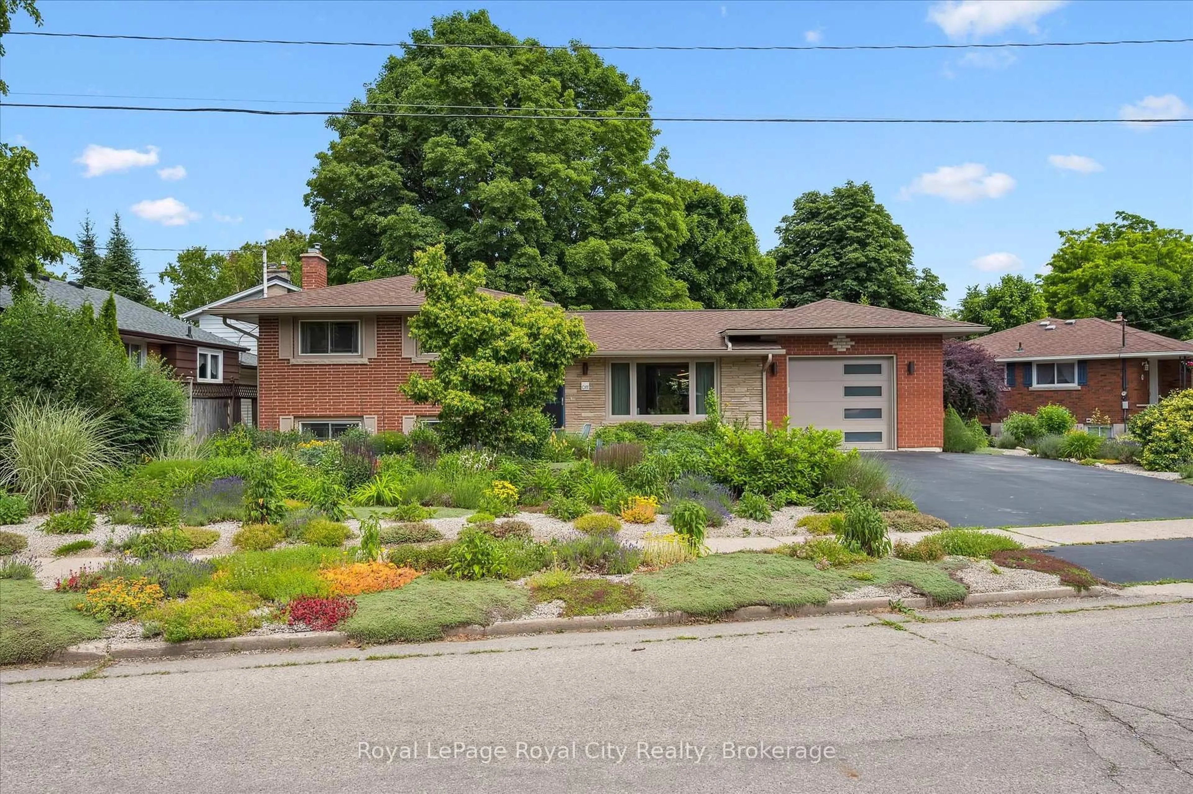 Home with brick exterior material, street for 1 Balmoral Dr, Guelph Ontario N1E 3N5