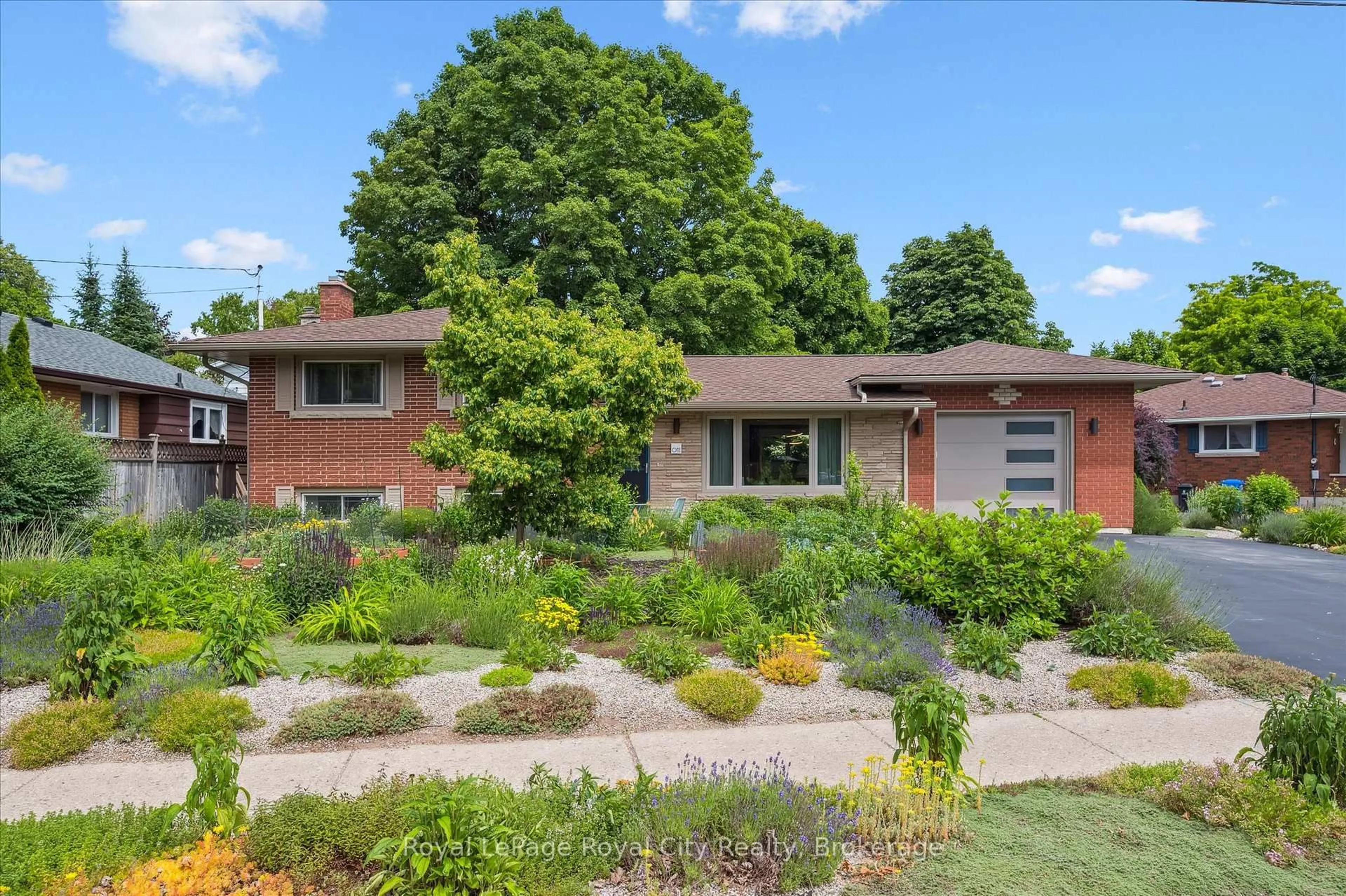 Home with brick exterior material, street for 1 Balmoral Dr, Guelph Ontario N1E 3N5