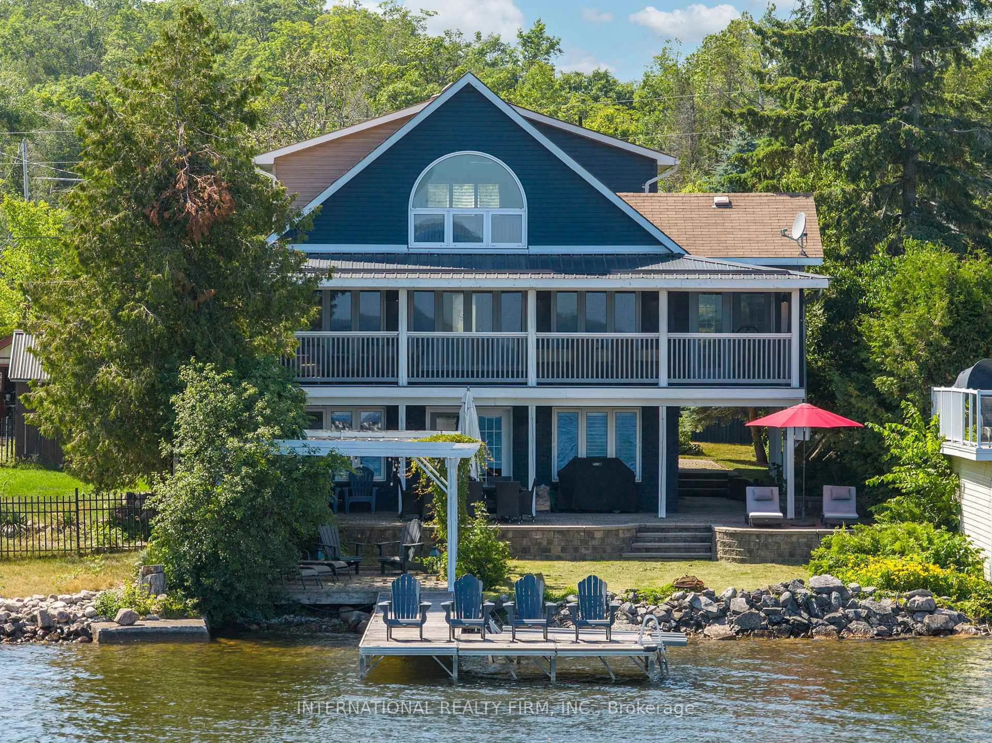 A pic from outside/outdoor area/front of a property/back of a property/a pic from drone, water/lake/river/ocean view for 49 Cedar Dale Dr, Kawartha Lakes Ontario K0M 2B0