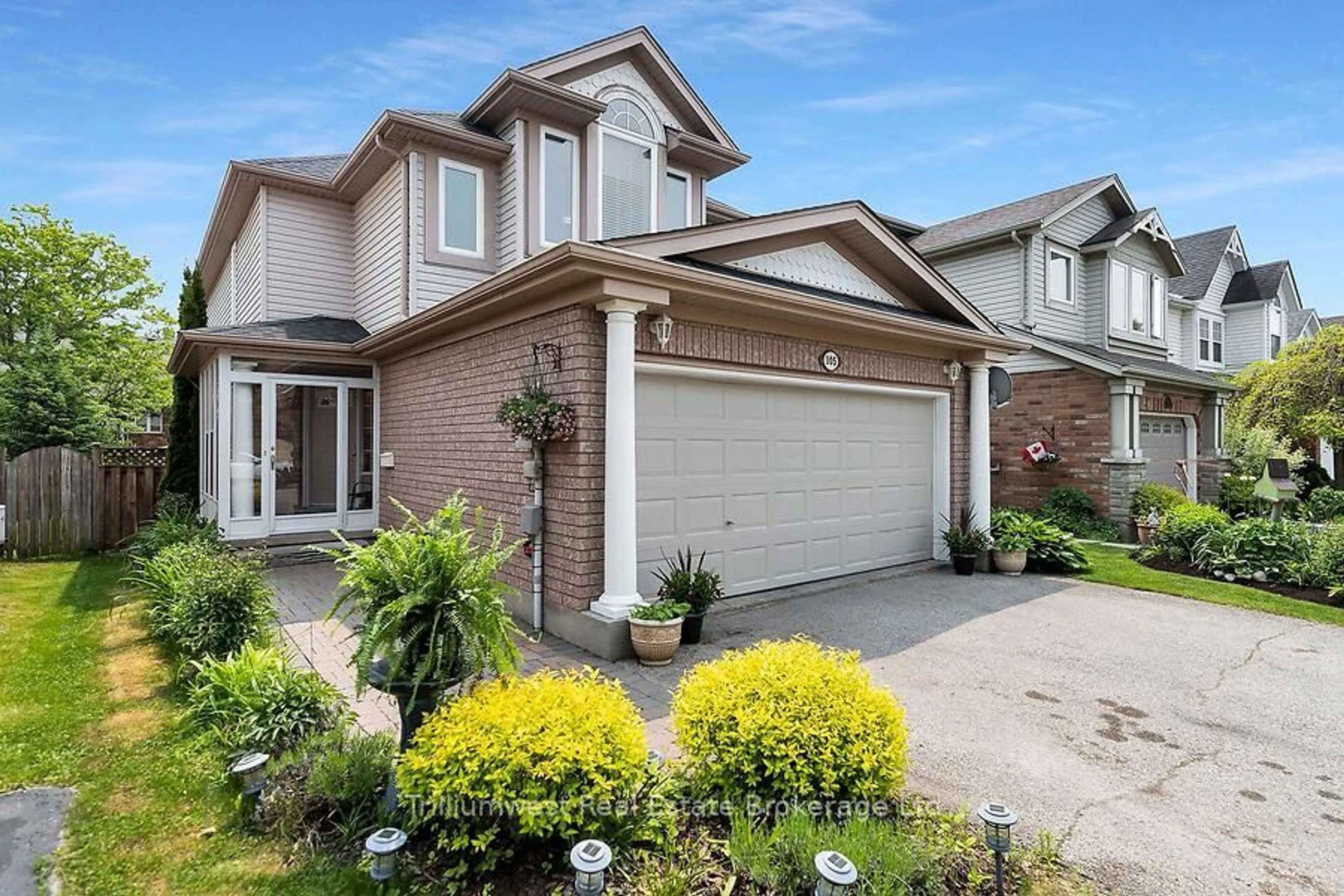 Home with brick exterior material, street for 105 Southcreek Tr, Guelph Ontario N1G 5A7