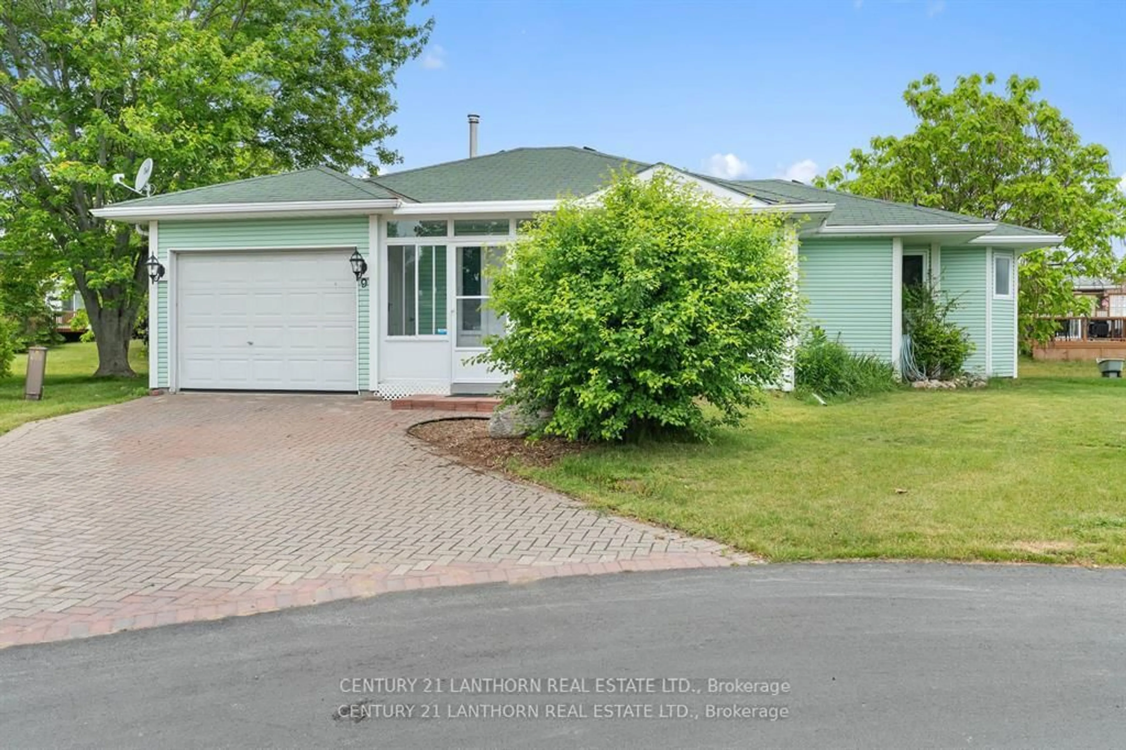 A pic from outside/outdoor area/front of a property/back of a property/a pic from drone, street for 9 Reynolds Pl, Prince Edward County Ontario K0K 3L0