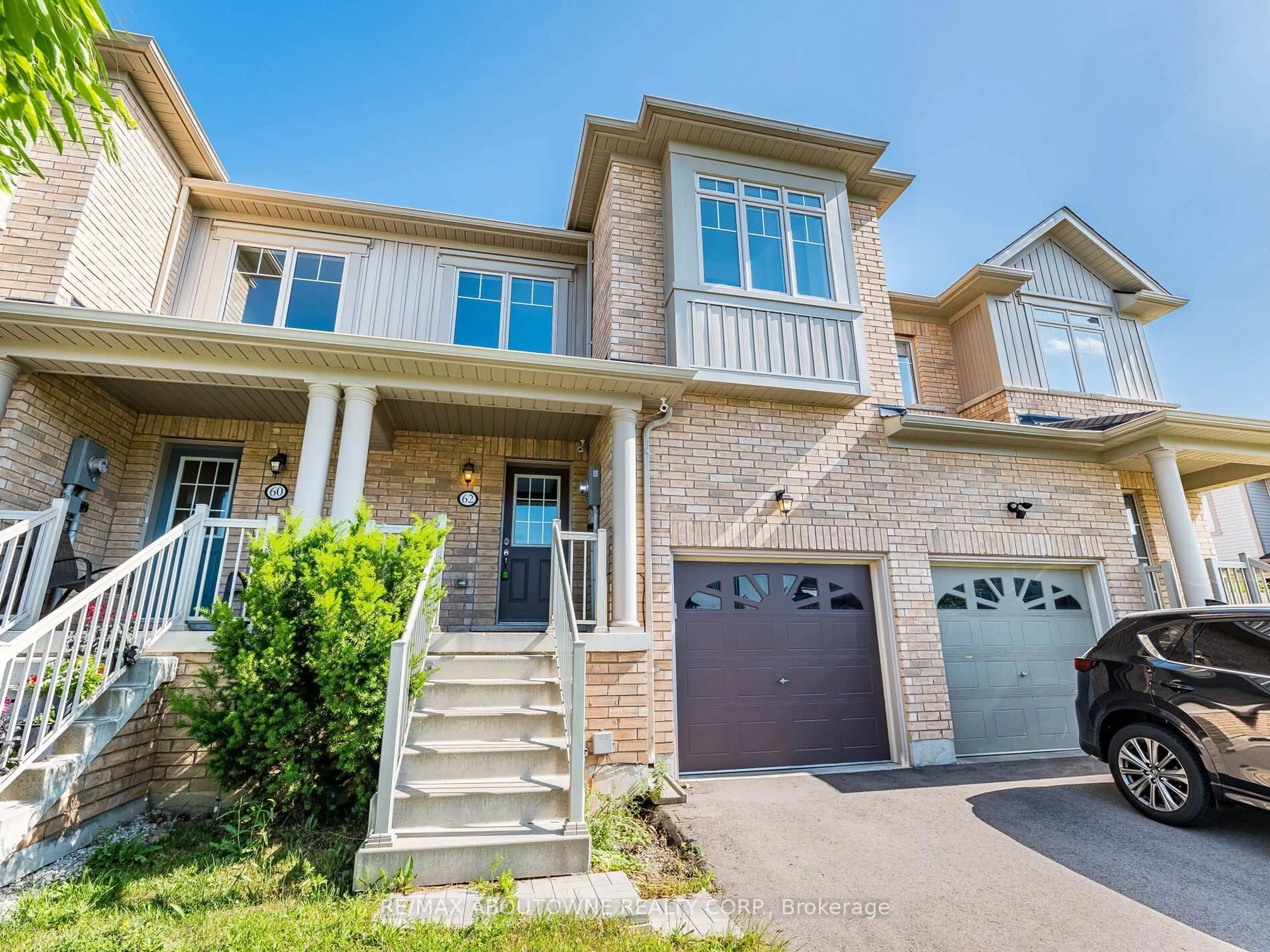 Home with brick exterior material, street for 62 Skinner Dr, Guelph Ontario N1E 0E7