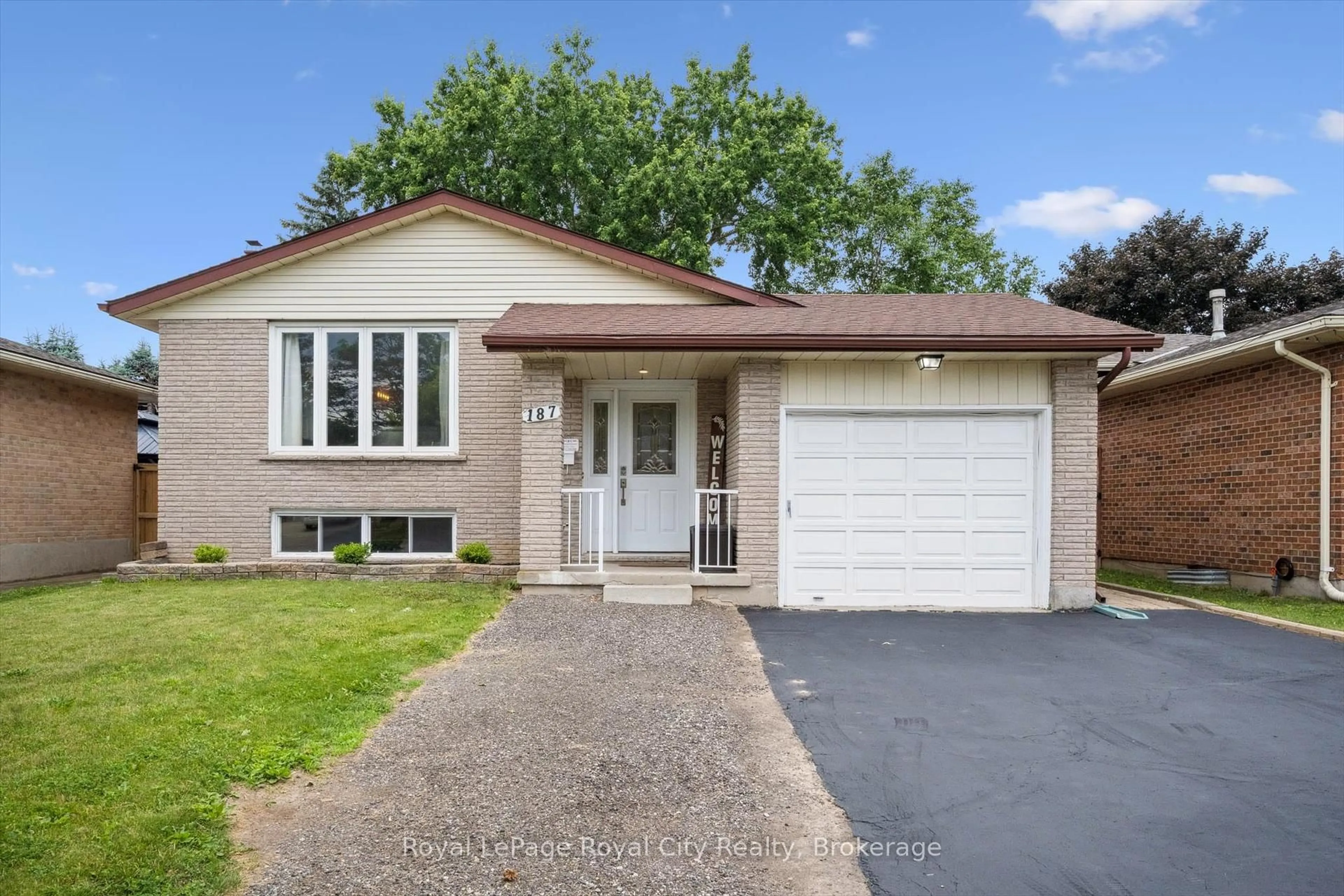 Home with brick exterior material, street for 187 The Country Way, Kitchener Ontario N2E 2T5