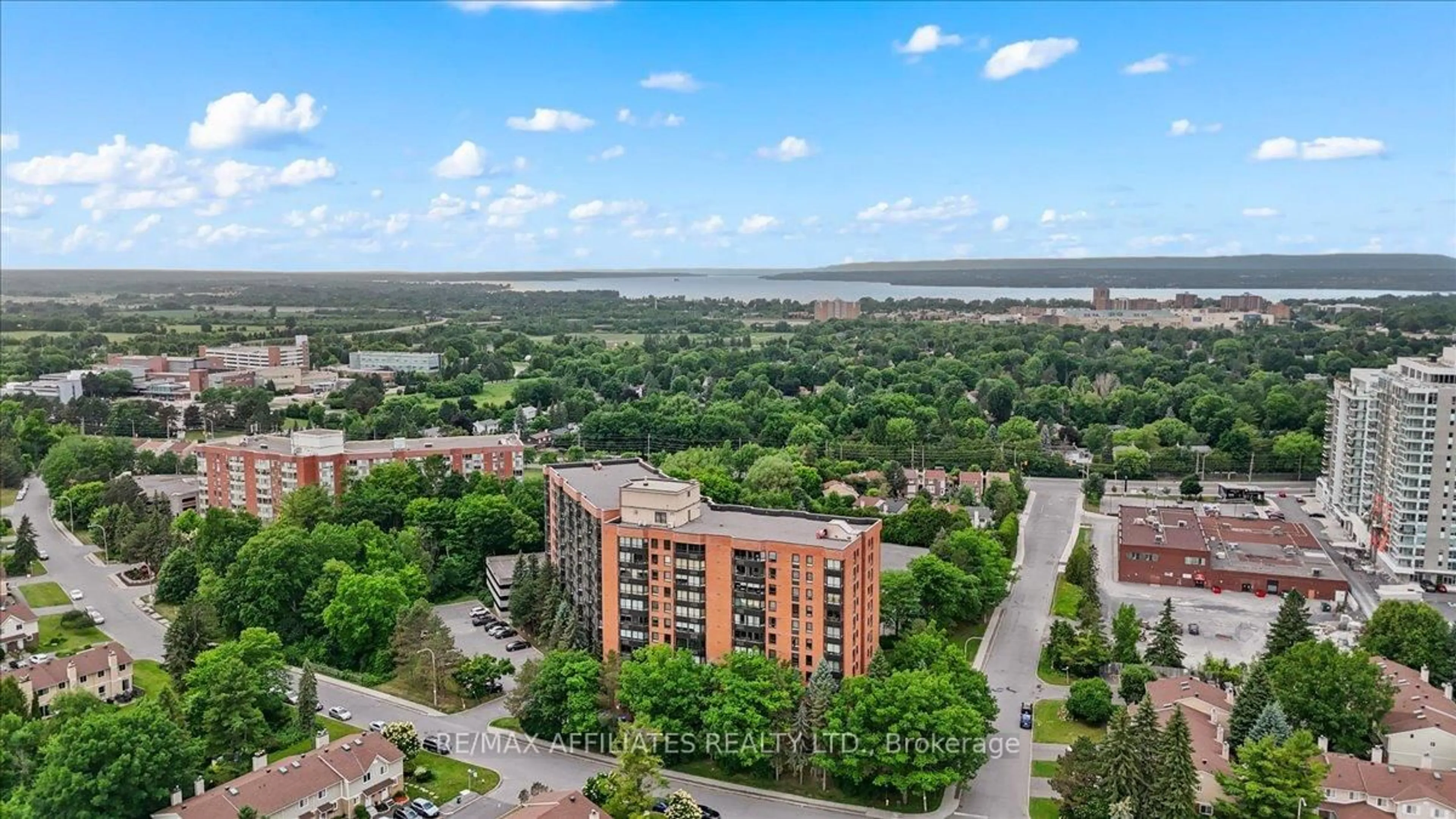 A pic from outside/outdoor area/front of a property/back of a property/a pic from drone, water/lake/river/ocean view for 80 Sandcastle Dr #613, Ottawa Ontario K2H 9E7