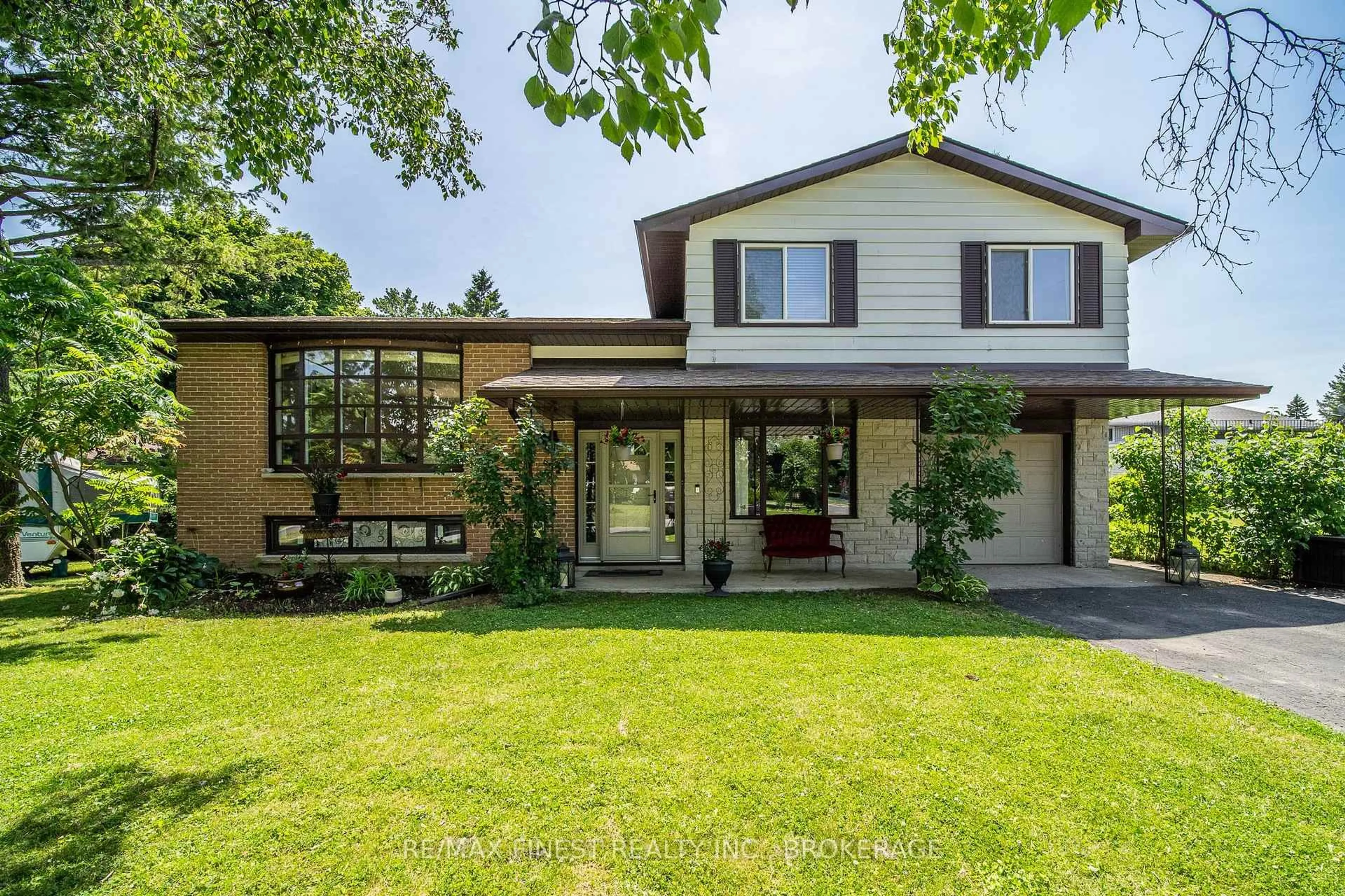 Home with vinyl exterior material, street for 671 Sussex Blvd, Kingston Ontario K7M 5B2