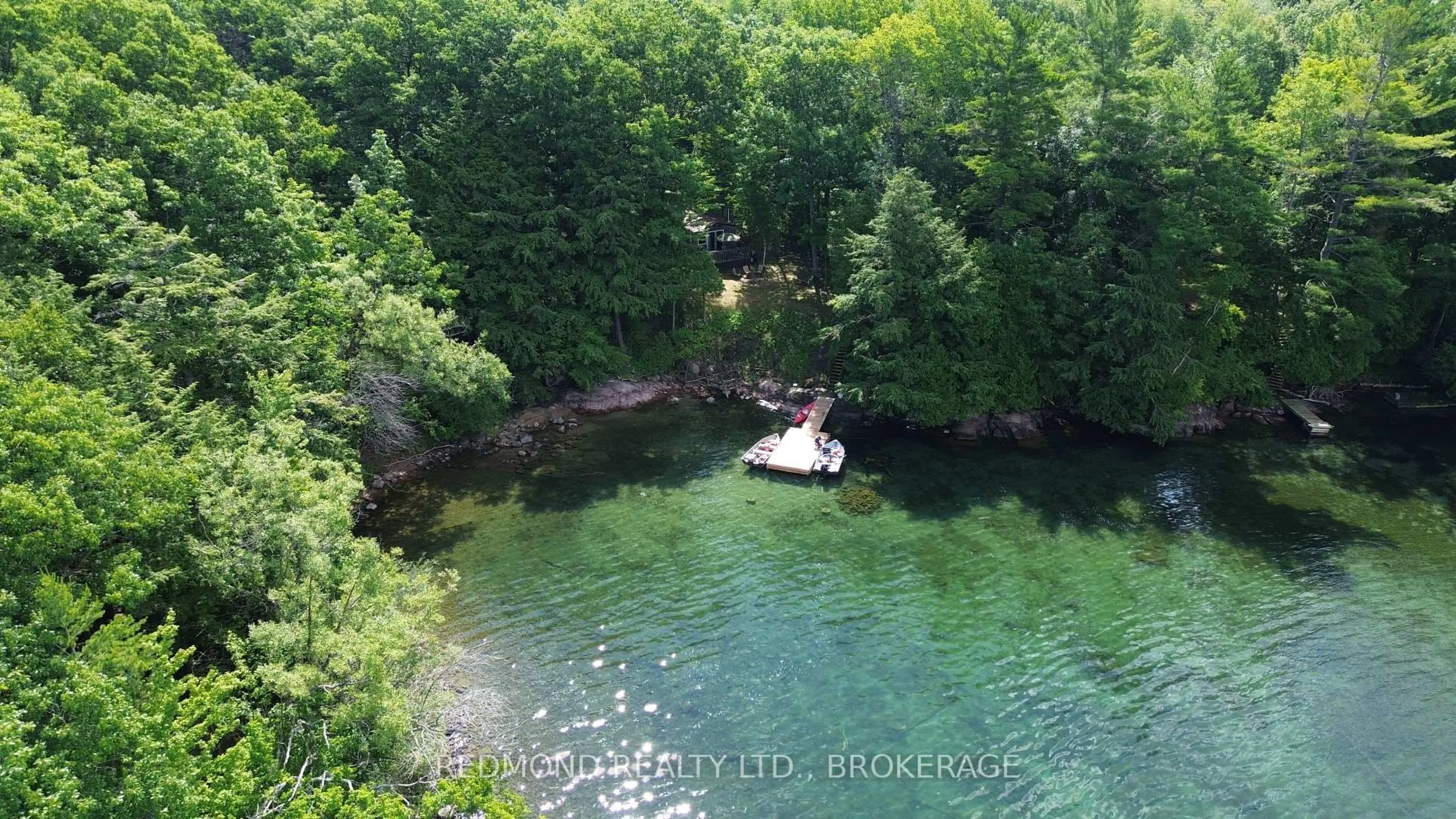 A pic from outside/outdoor area/front of a property/back of a property/a pic from drone, water/lake/river/ocean view for 118 Big Stave Island, Lansdowne Ontario K0E 1L0
