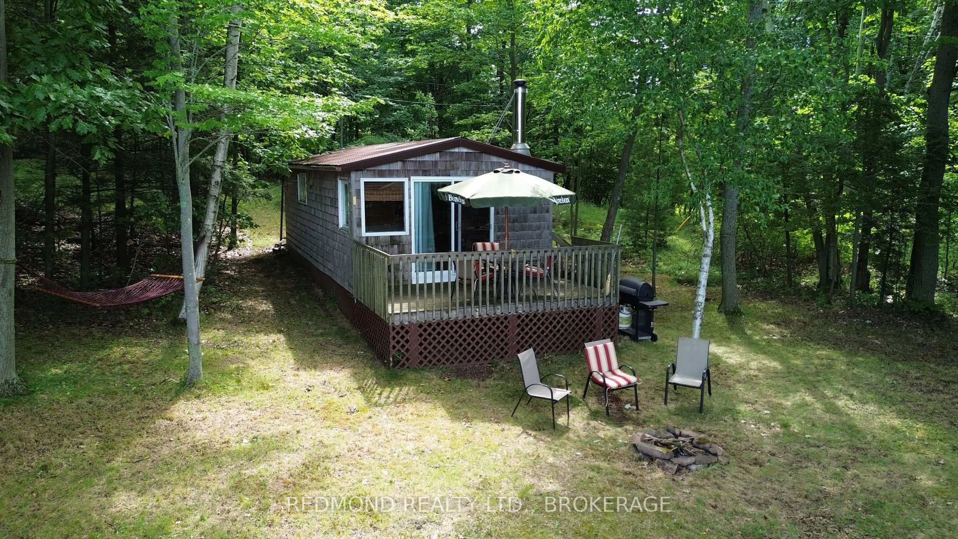 A pic from outside/outdoor area/front of a property/back of a property/a pic from drone, water/lake/river/ocean view for 118 Big Stave Island, Lansdowne Ontario K0E 1L0