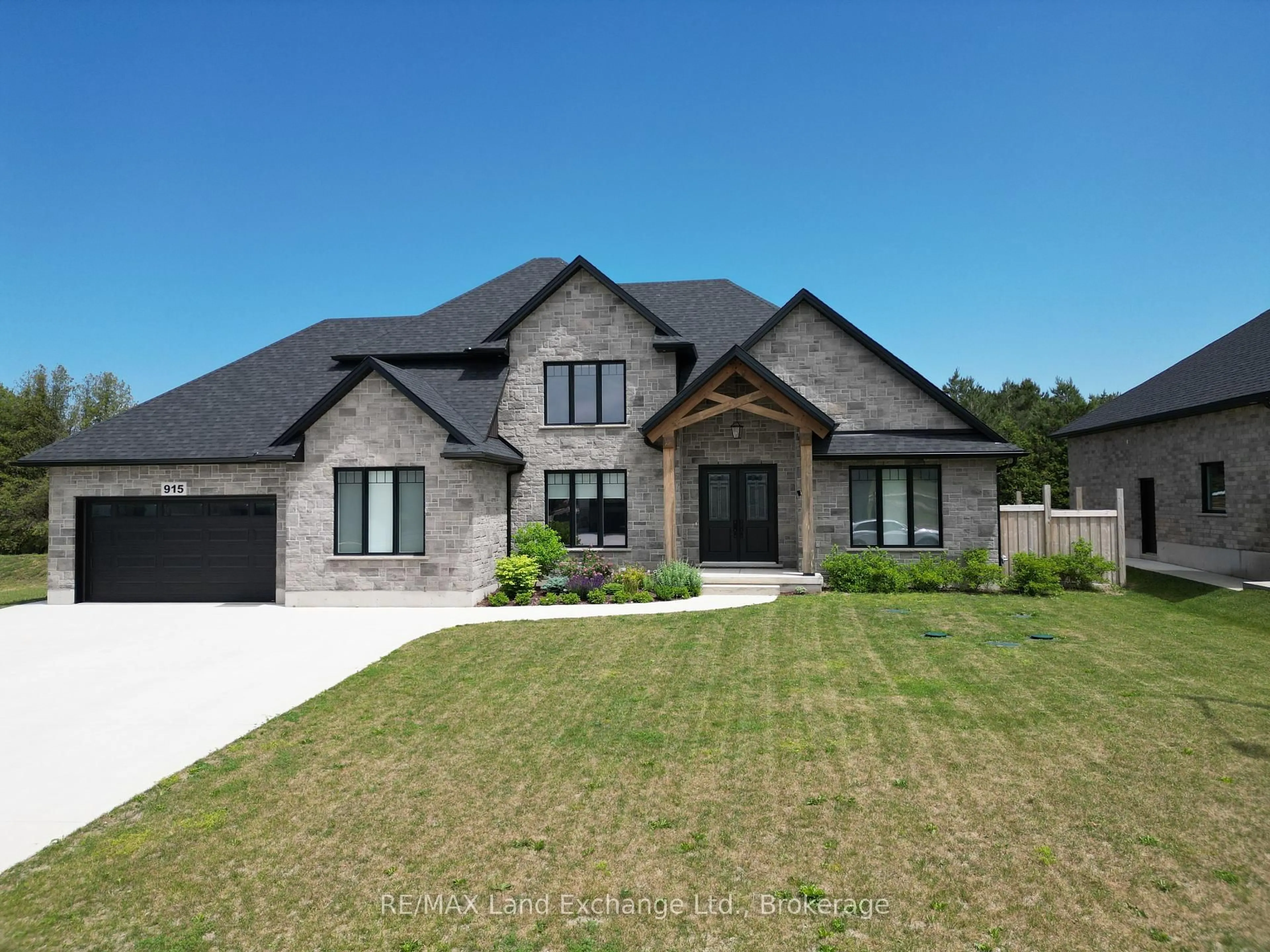 Home with brick exterior material, street for 915 Bogdanovic Way, Huron-Kinloss Ontario N2Z 0H3