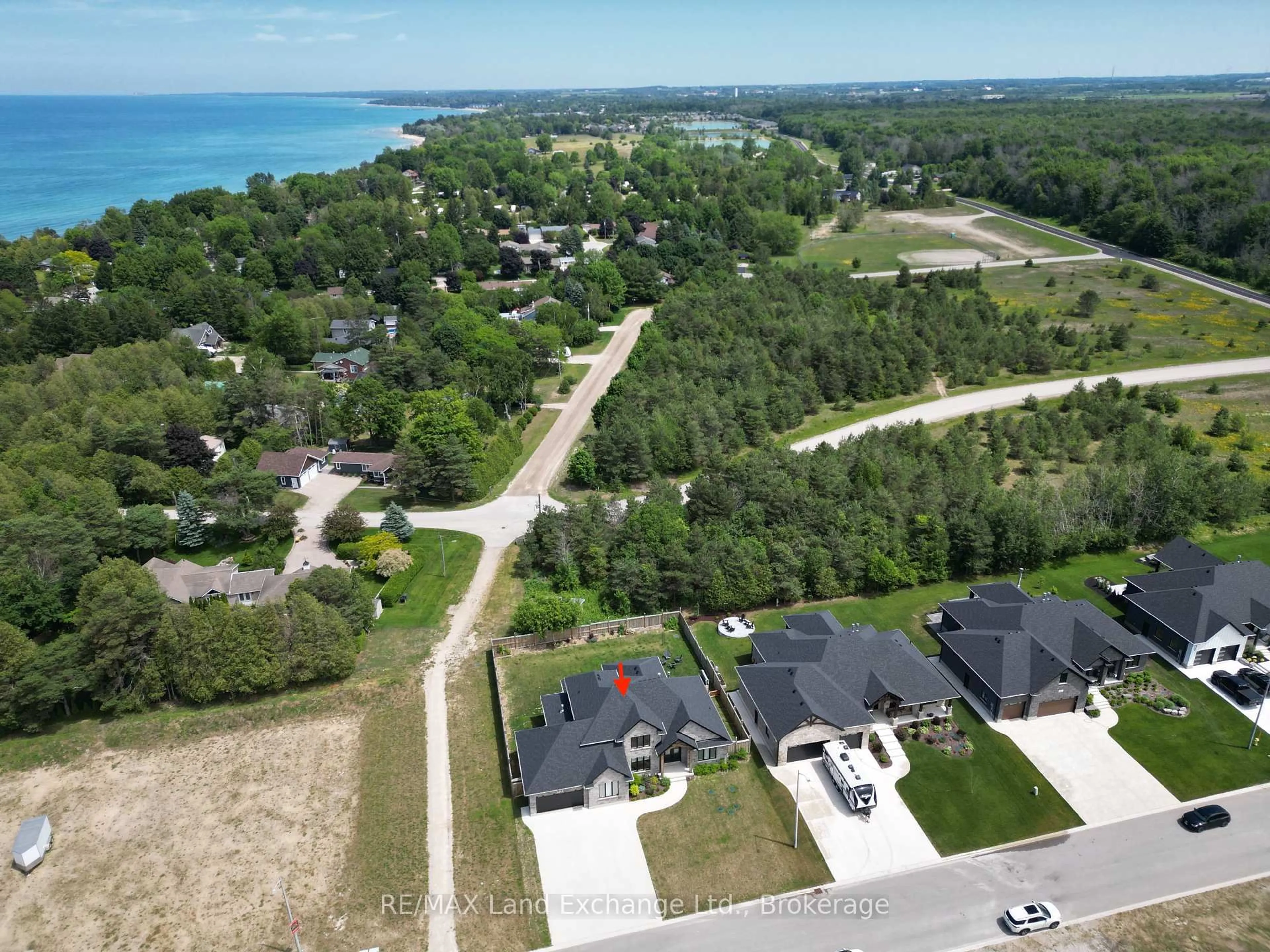 A pic from outside/outdoor area/front of a property/back of a property/a pic from drone, water/lake/river/ocean view for 915 Bogdanovic Way, Huron-Kinloss Ontario N2Z 0H3