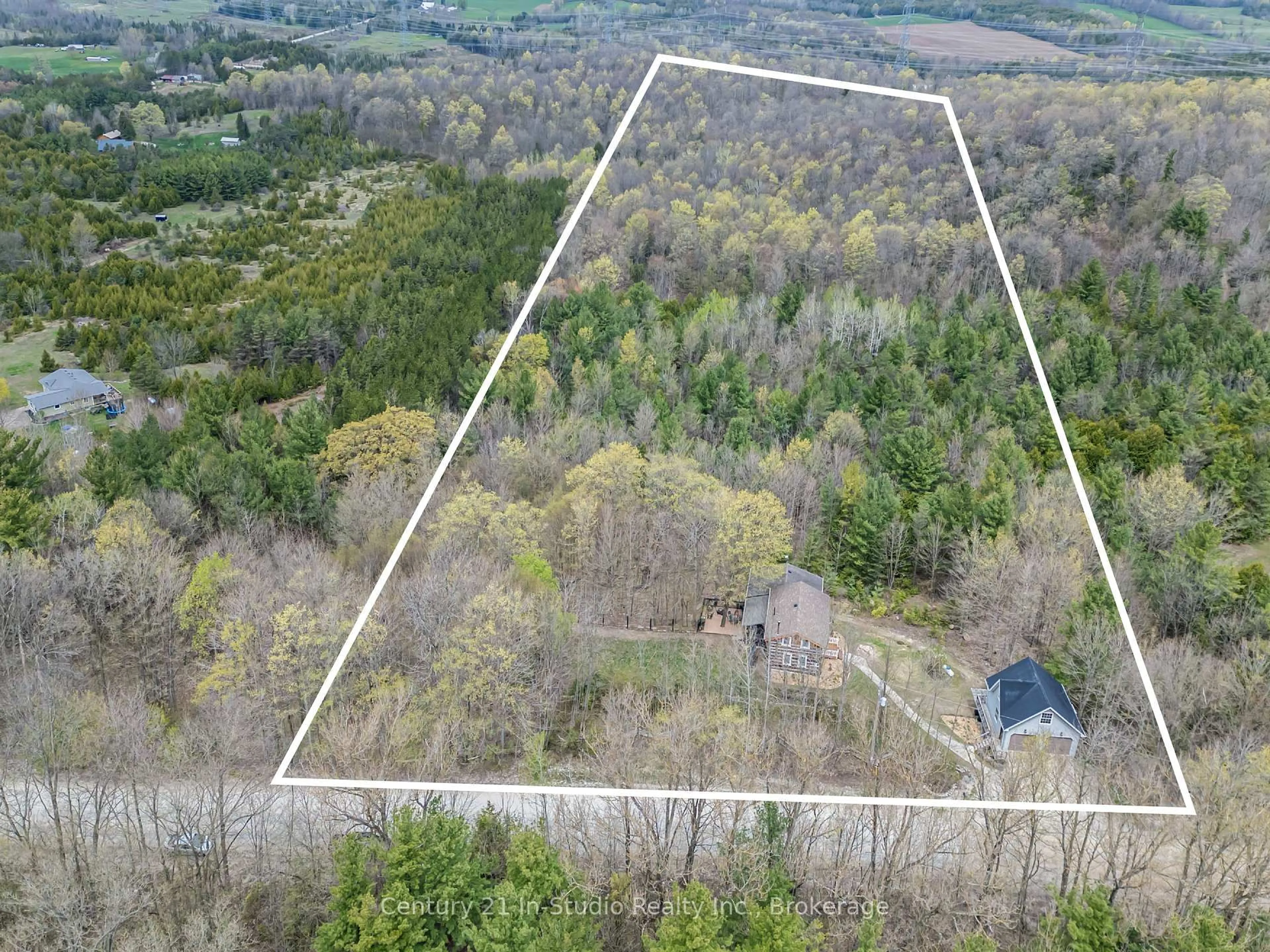 A pic from outside/outdoor area/front of a property/back of a property/a pic from drone, forest/trees view for 302051 Concession 2 SDR, West Grey Ontario N4N 3B8