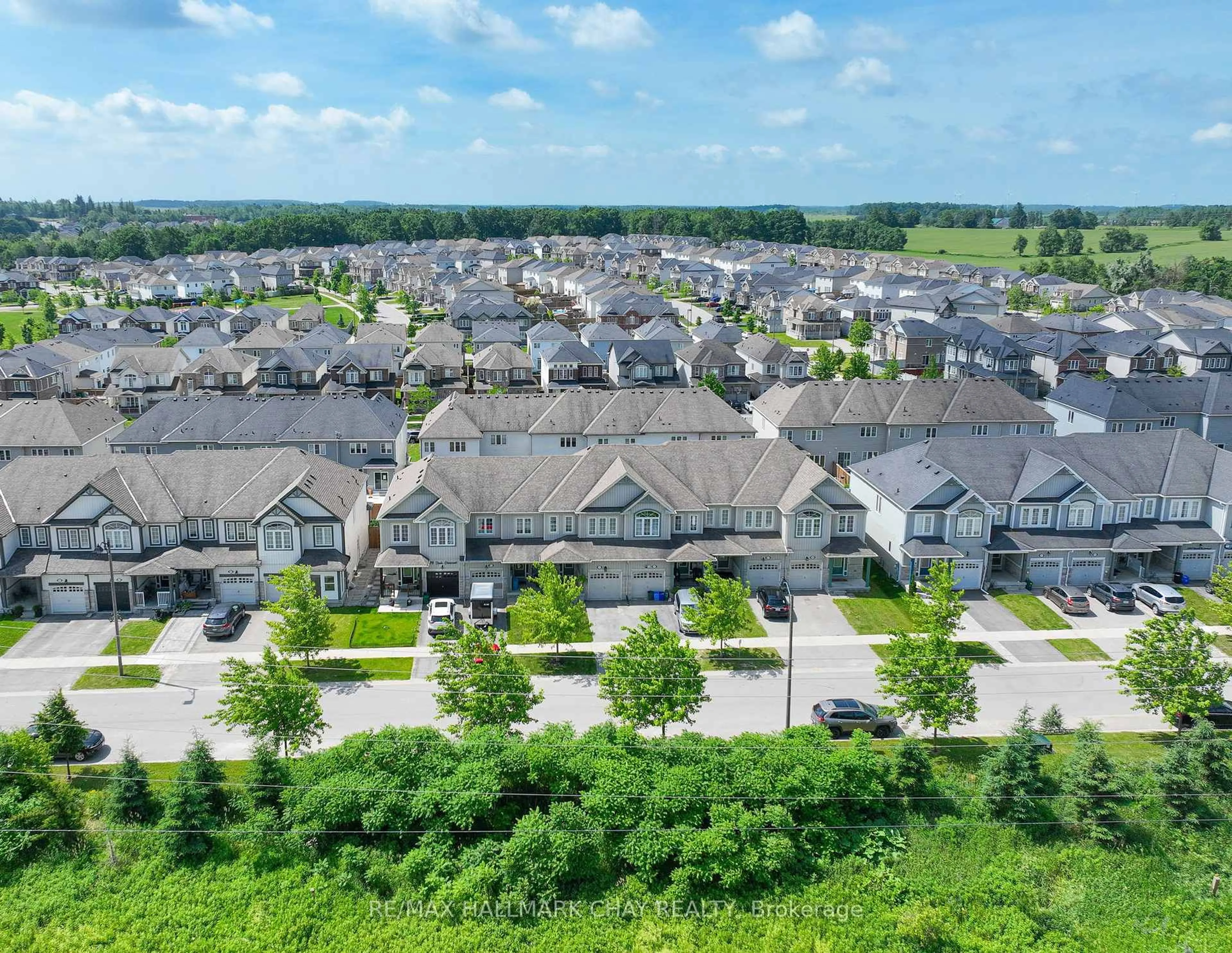 A pic from outside/outdoor area/front of a property/back of a property/a pic from drone, street for 883 Cook Cres, Melancthon Ontario L9V 3V1