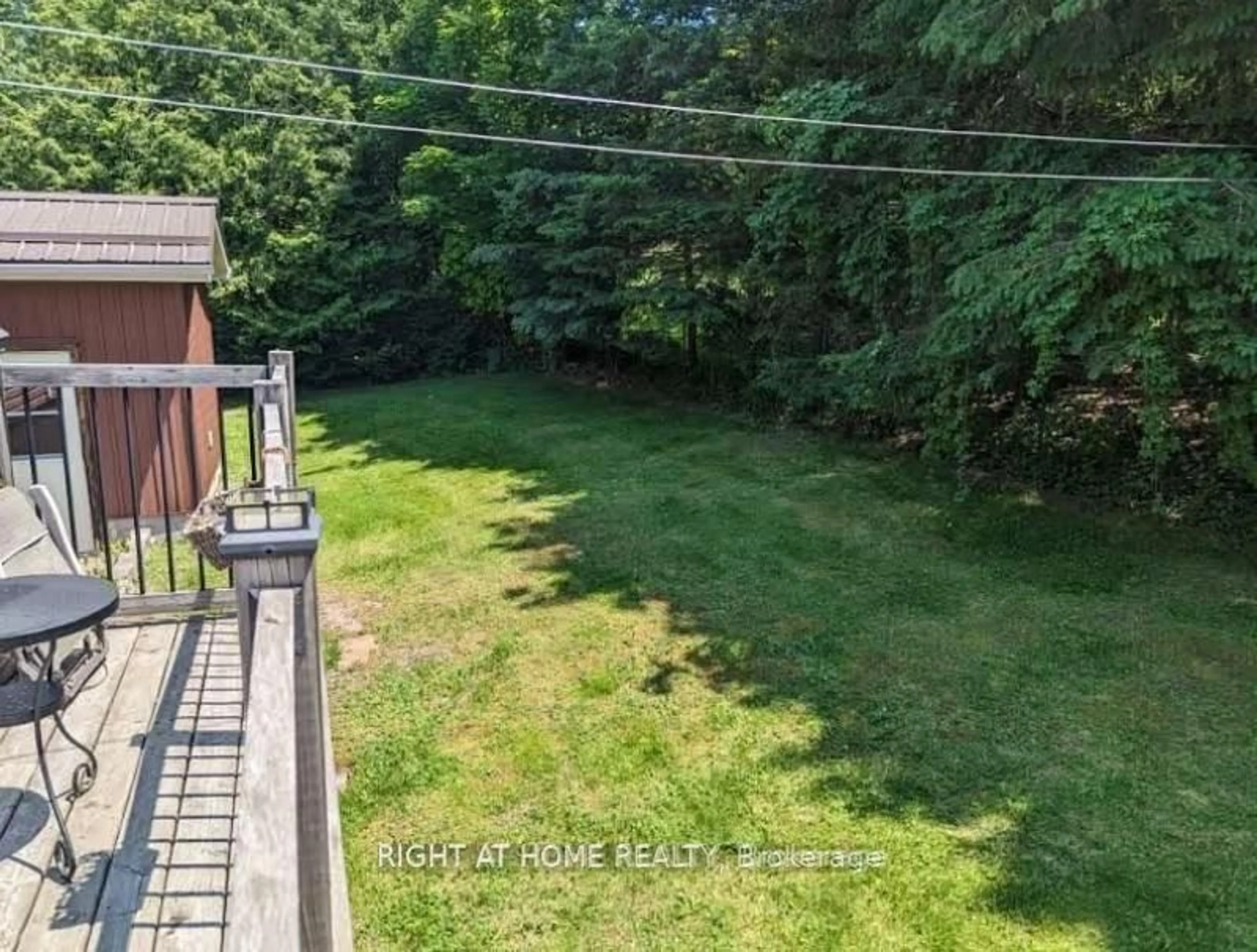 A pic from outside/outdoor area/front of a property/back of a property/a pic from drone, forest/trees view for 4 Lakeshore Rd, Limoges Ontario K0K 2M0