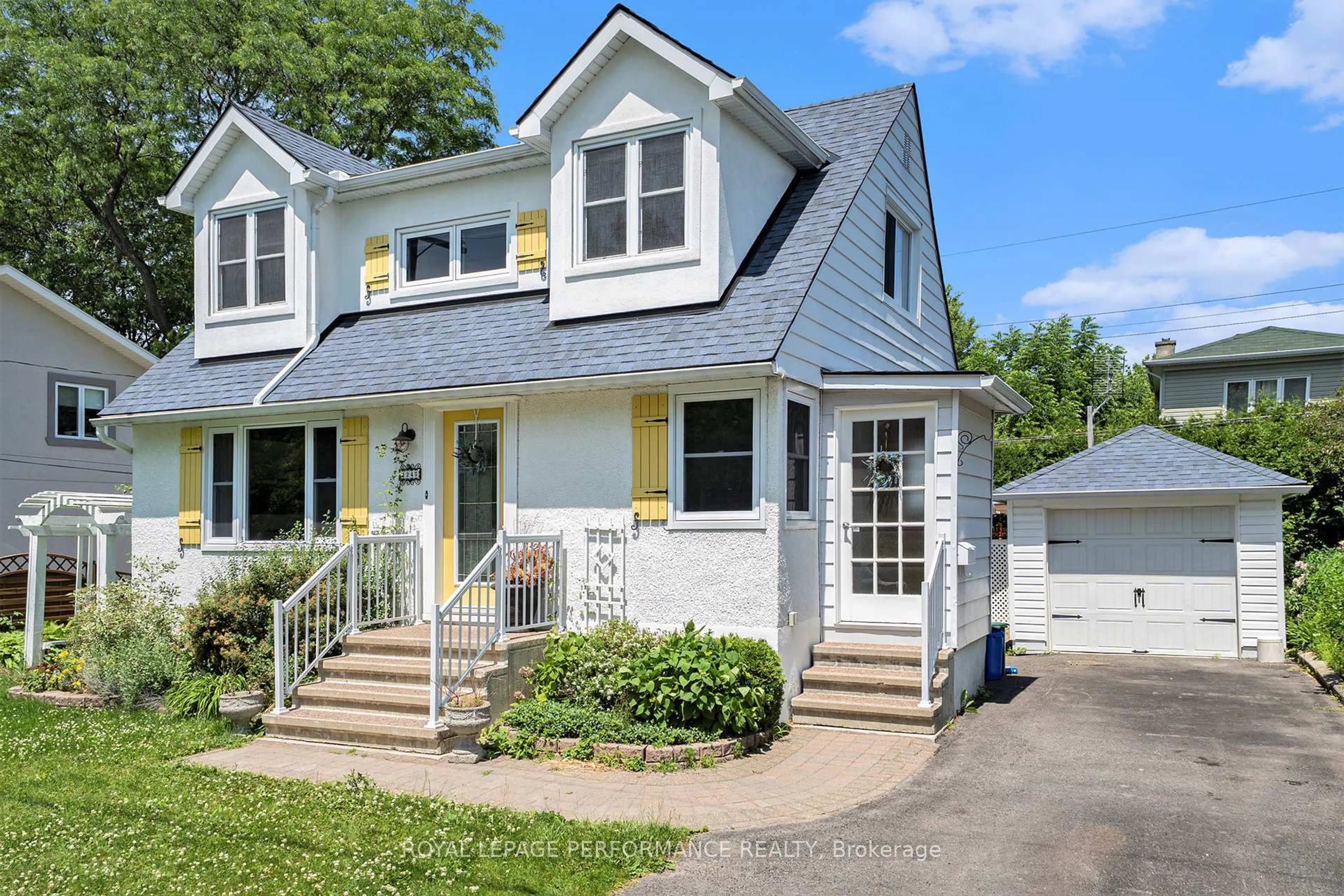 Home with vinyl exterior material, street for 1245 Randall Ave, Ottawa Ontario K1H 7P9