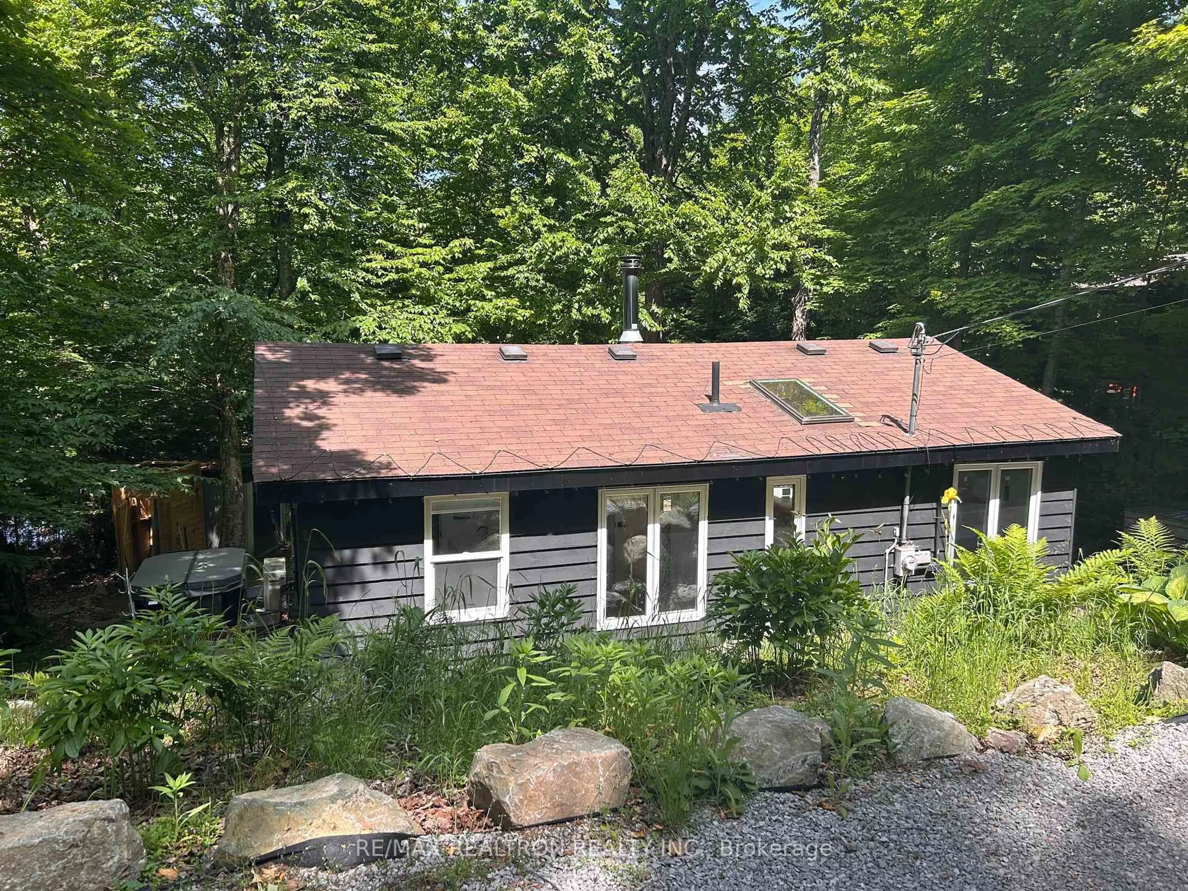 A pic from outside/outdoor area/front of a property/back of a property/a pic from drone, unknown for 1053 Esson Creek Lane, Highlands East Ontario K0L 3C0