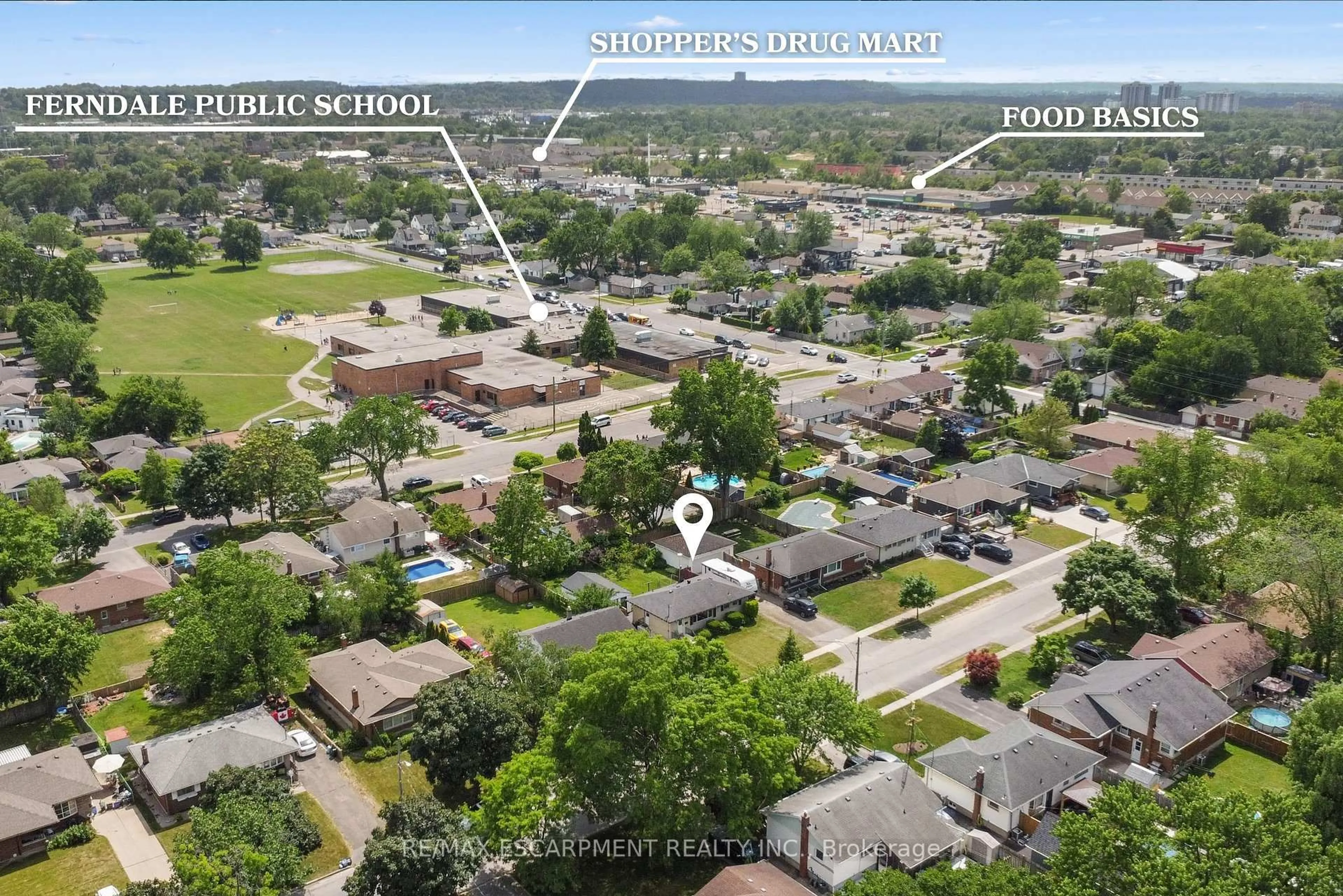 A pic from outside/outdoor area/front of a property/back of a property/a pic from drone, street for 46 Burness Dr, St. Catharines Ontario L2P 1J5