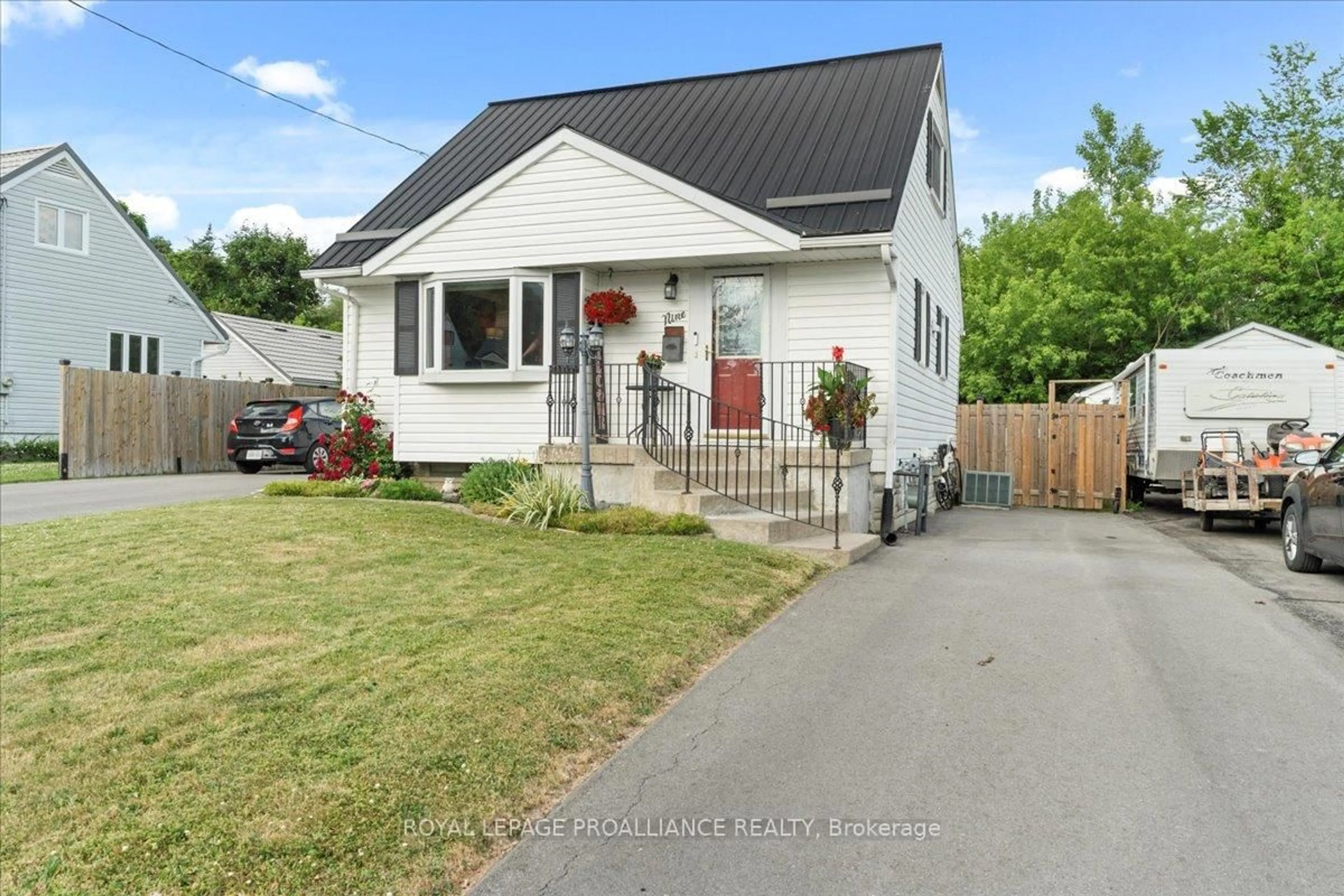 Home with vinyl exterior material, street for 9 Sixth St, Belleville Ontario K8N 4S4