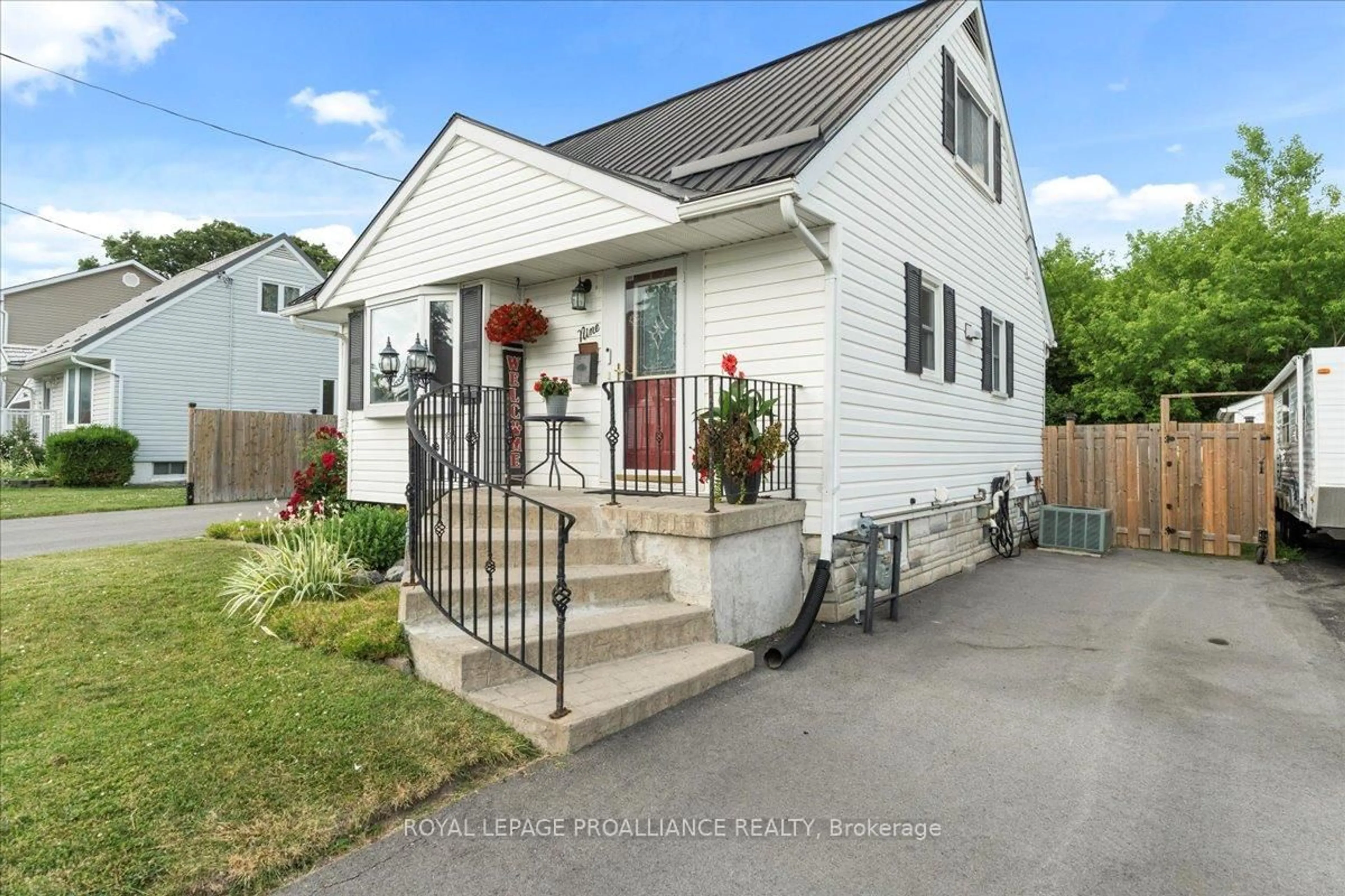 Home with vinyl exterior material, street for 9 Sixth St, Belleville Ontario K8N 4S4