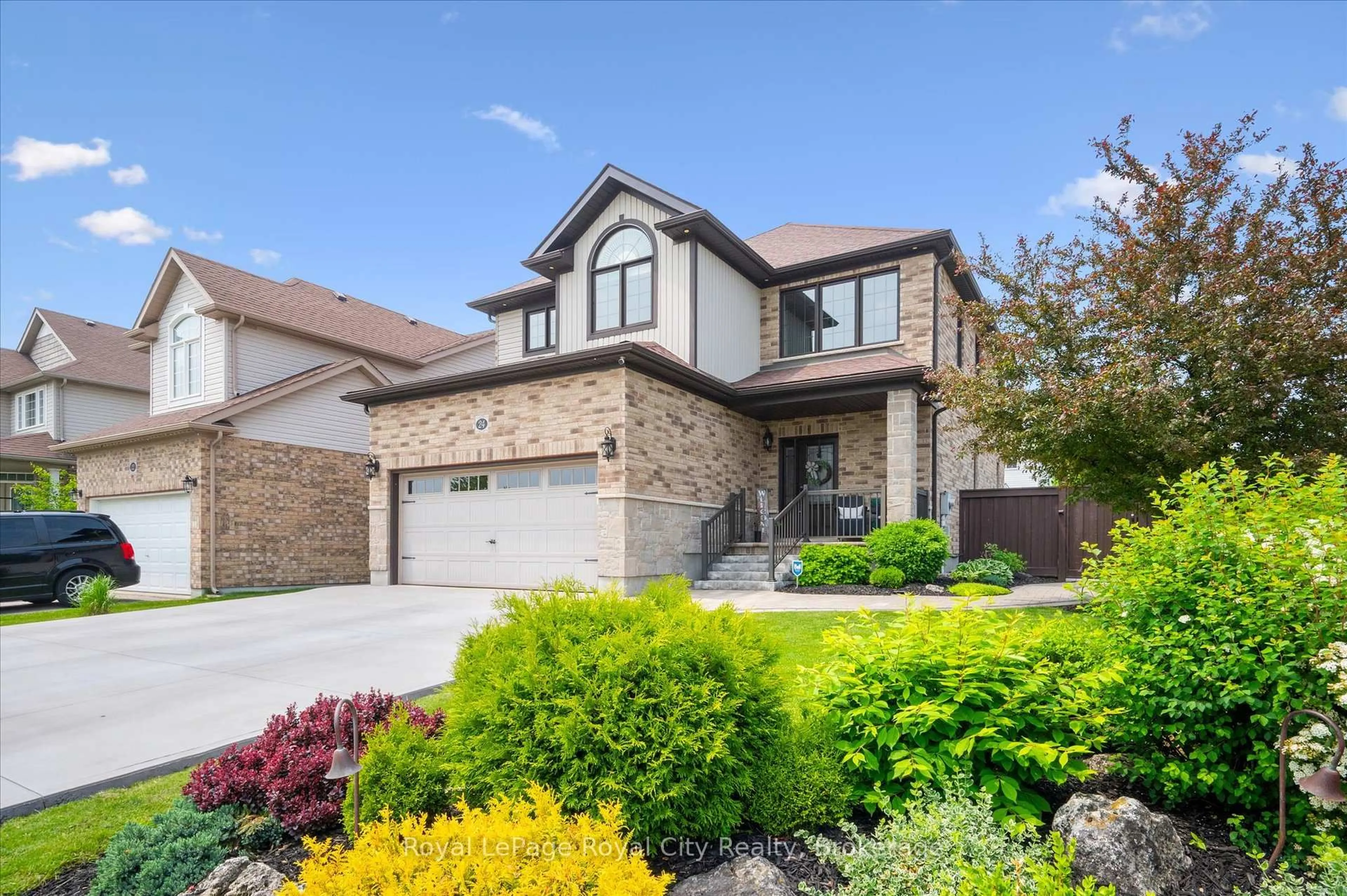 Home with brick exterior material, street for 24 Popham Dr, Guelph Ontario N1E 0B8