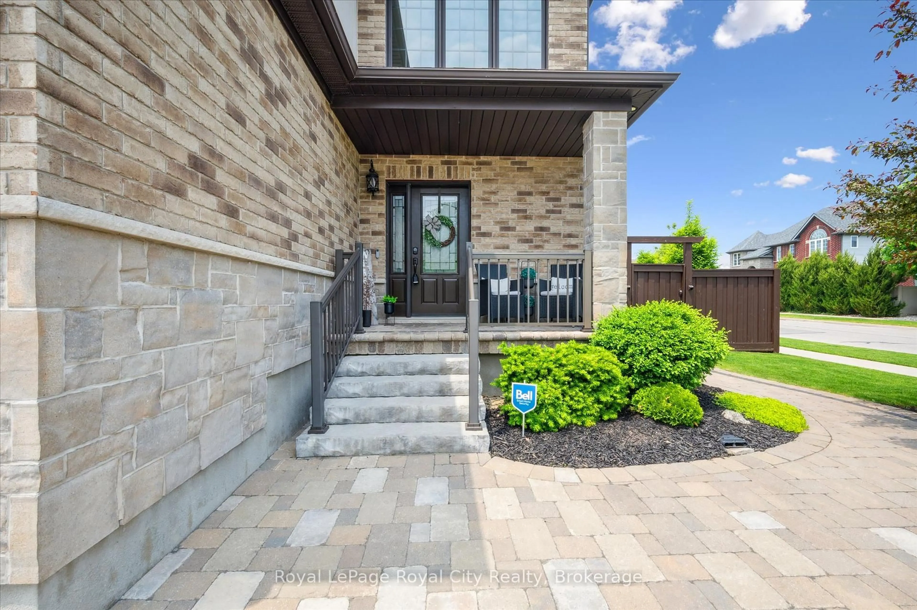 Home with brick exterior material, street for 24 Popham Dr, Guelph Ontario N1E 0B8