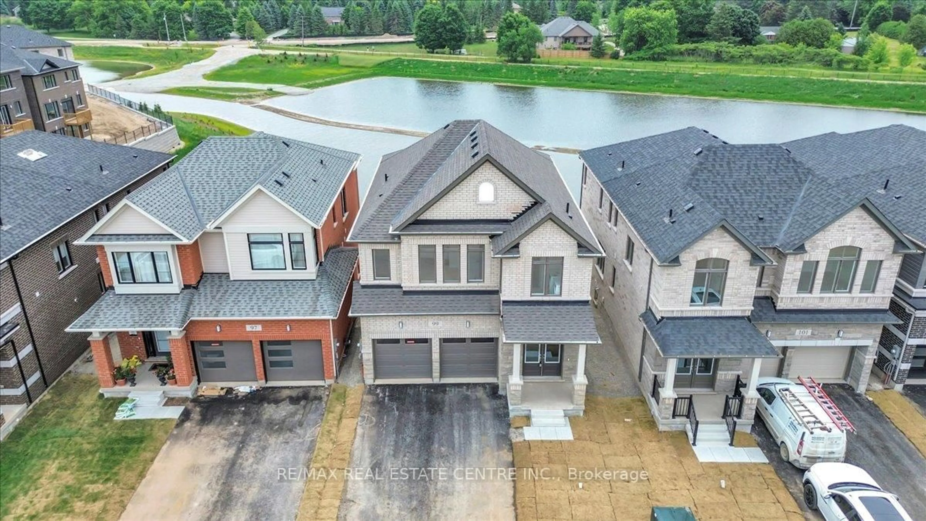 A pic from outside/outdoor area/front of a property/back of a property/a pic from drone, water/lake/river/ocean view for 99 Player Dr, Erin Ontario N0B 1T0