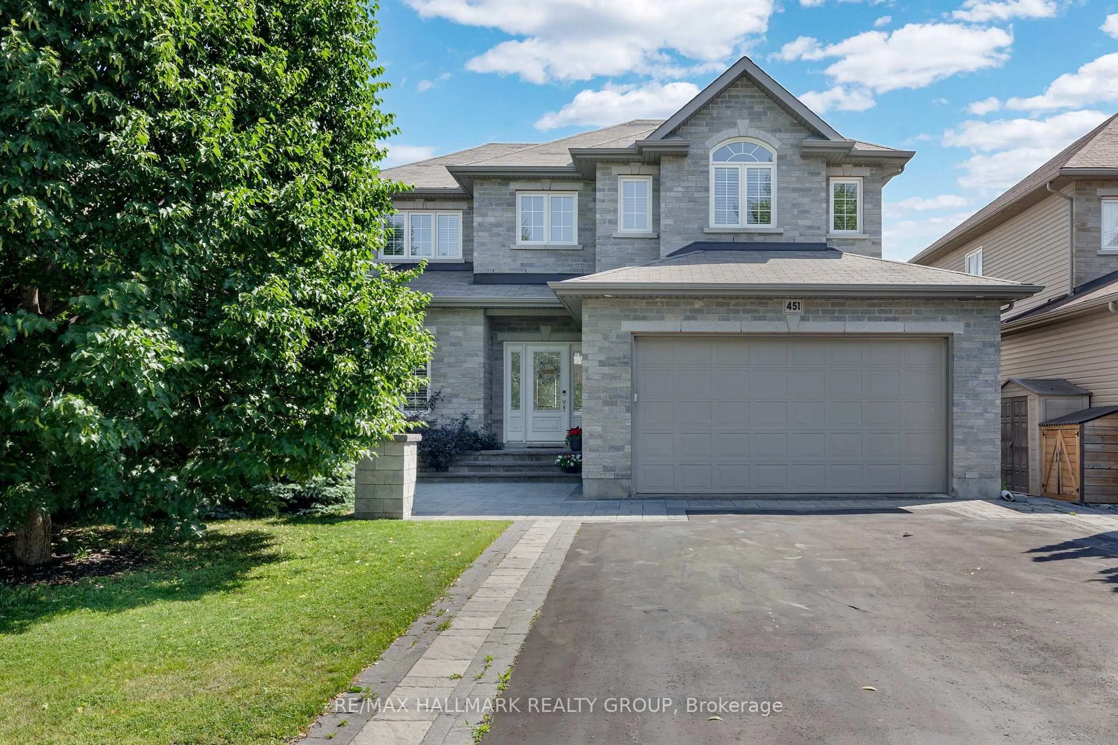 A pic from outside/outdoor area/front of a property/back of a property/a pic from drone, street for 451 LANDSWOOD Way, Ottawa Ontario K2S 0A4