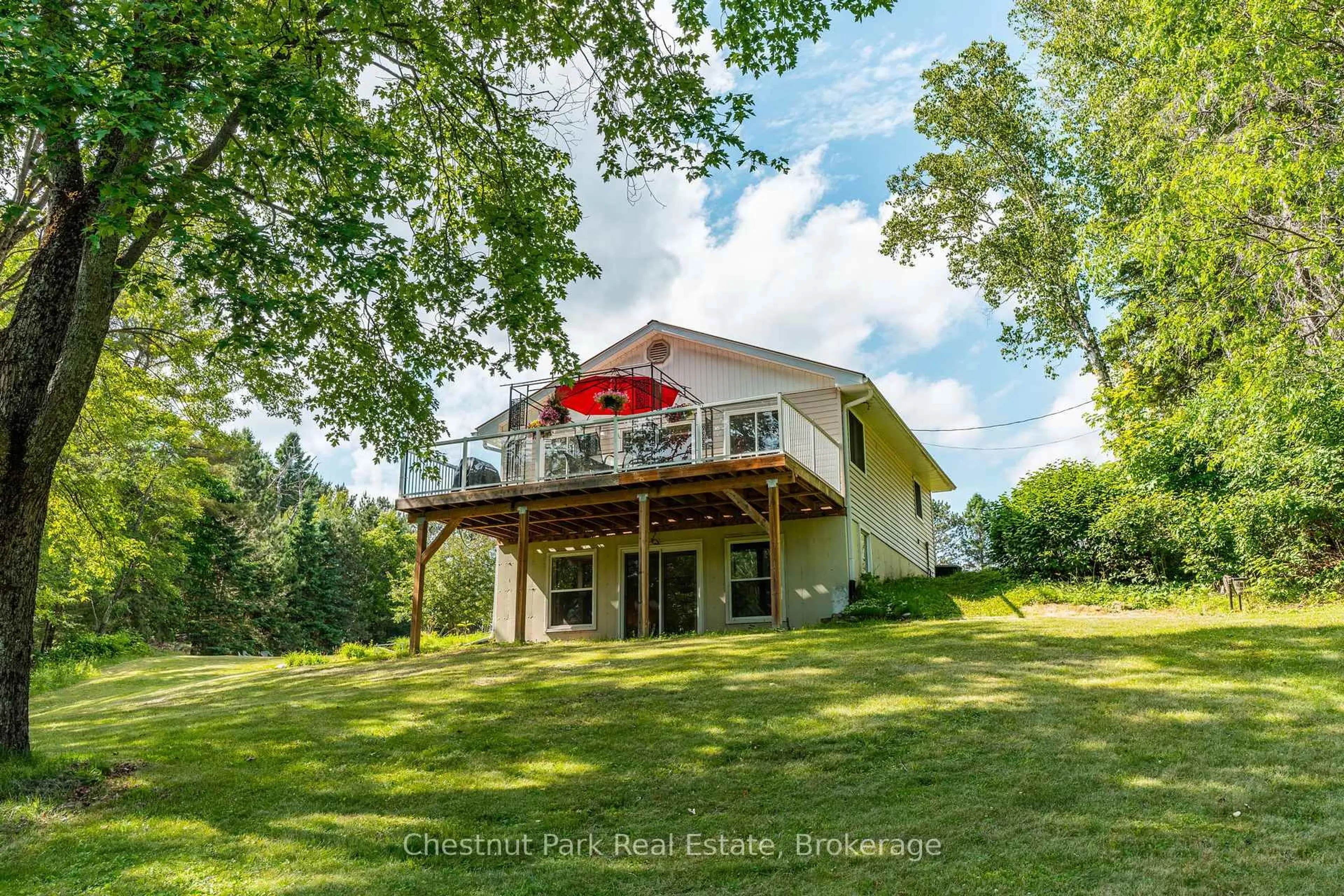 A pic from outside/outdoor area/front of a property/back of a property/a pic from drone, unknown for 1054 Green Lake Rd, Algonquin Highlands Ontario K0M 1J1