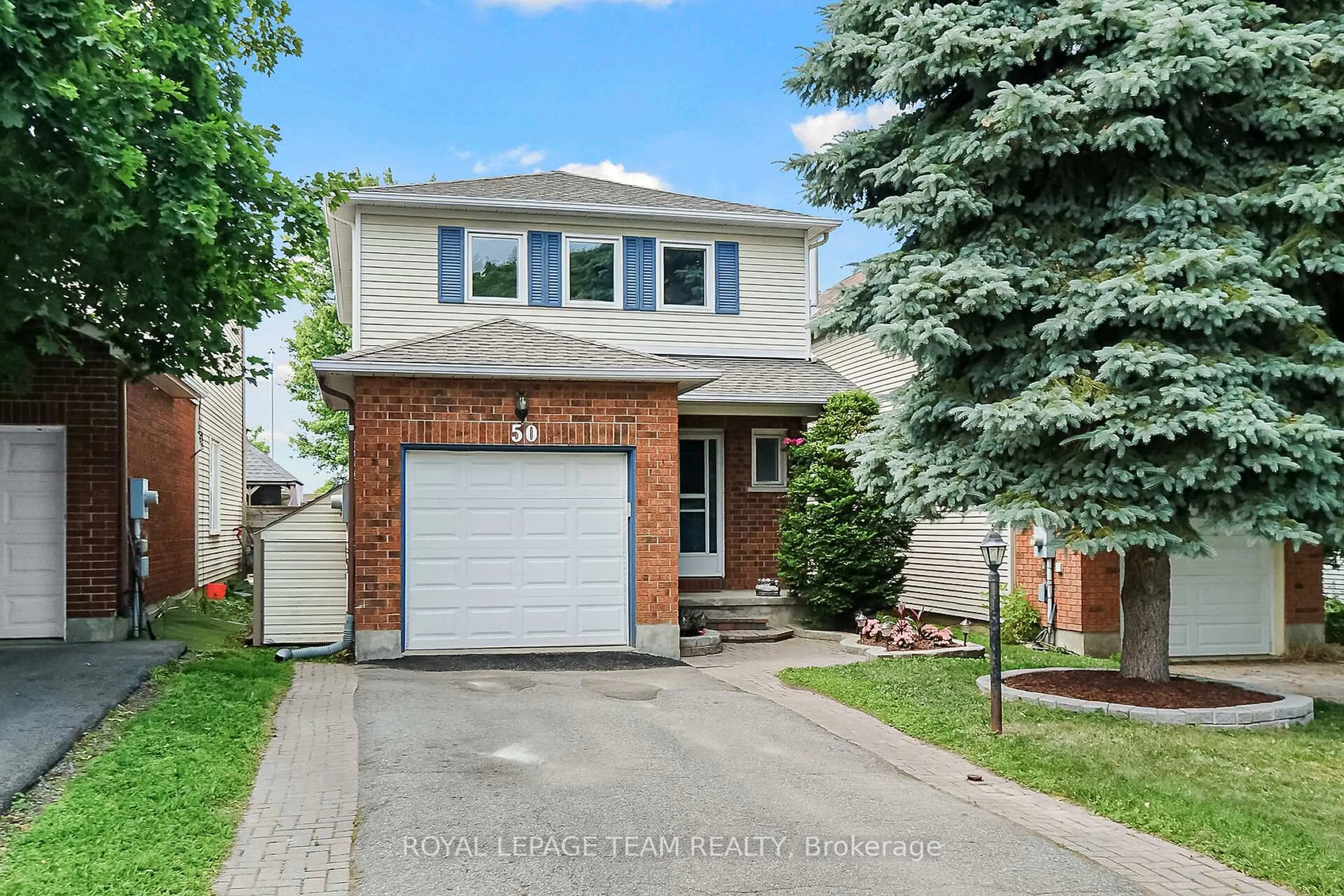 Home with brick exterior material, street for 50 Rowe Dr, Kanata Ontario K2L 3Y7