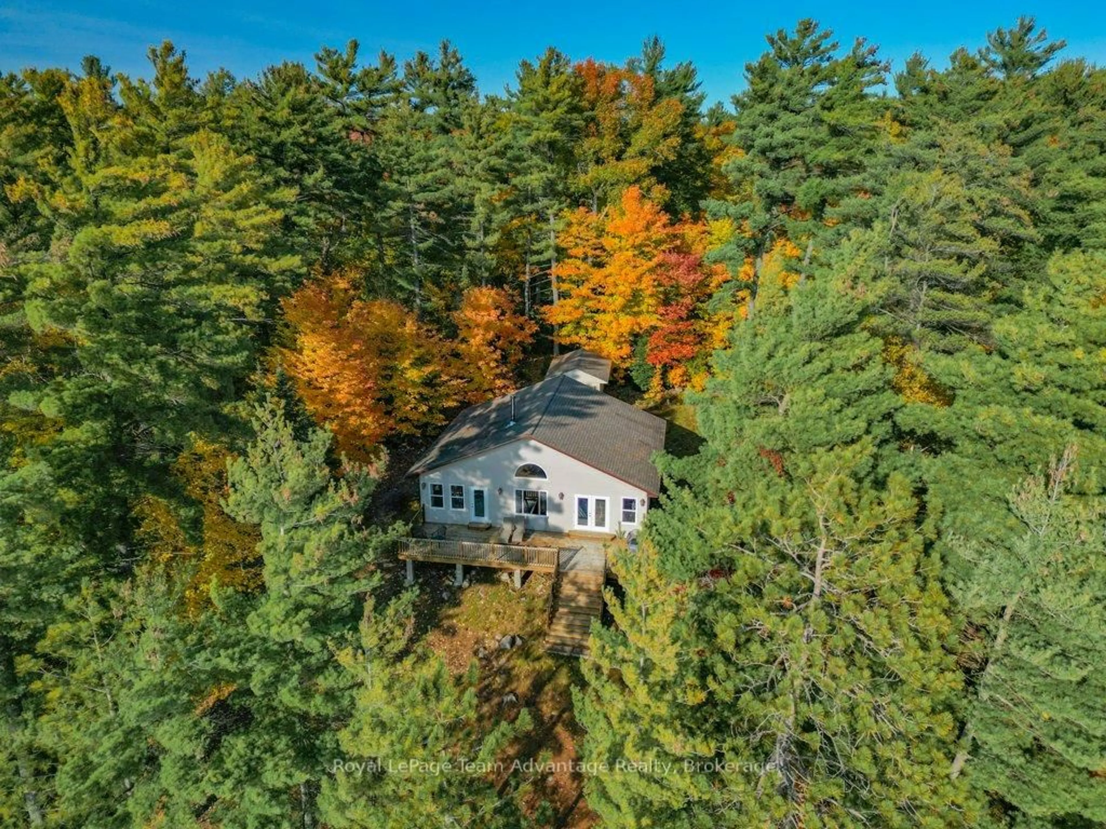 A pic from outside/outdoor area/front of a property/back of a property/a pic from drone, forest/trees view for 49 Harris Lake W/A, Parry Sound Remote Area Ontario P0G 1K0