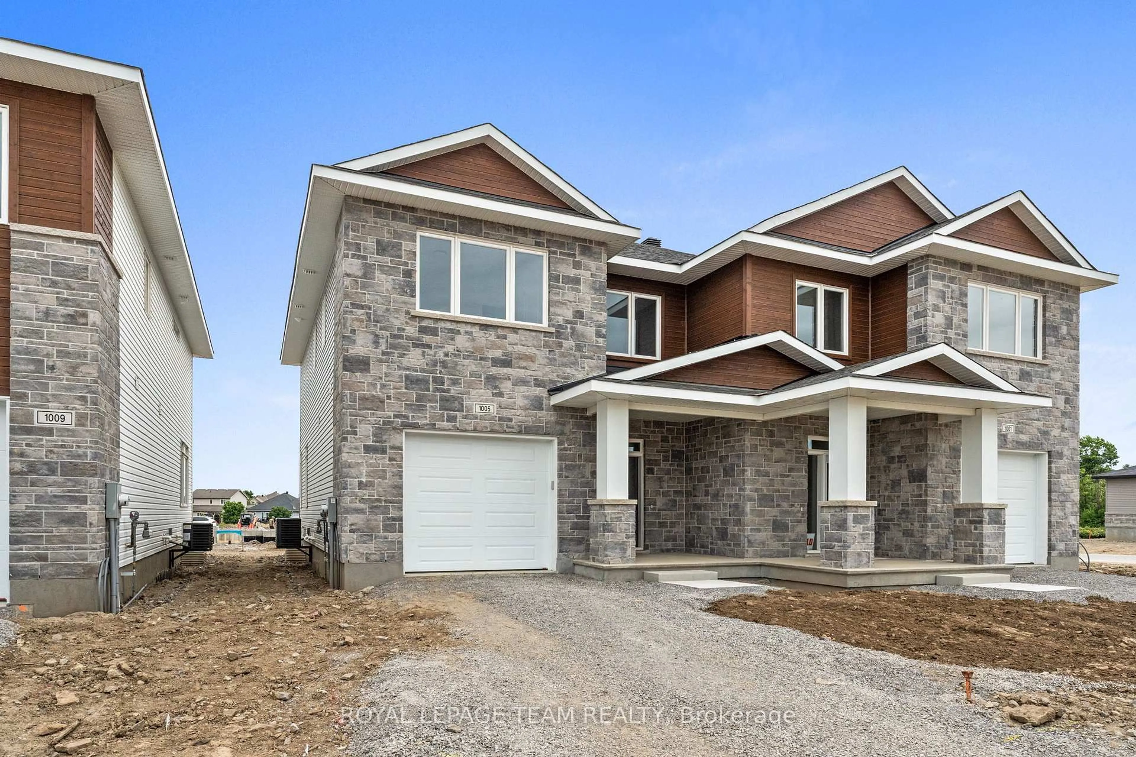 Home with brick exterior material, street for 1005 MOORE St, Brockville Ontario K6V 7N1