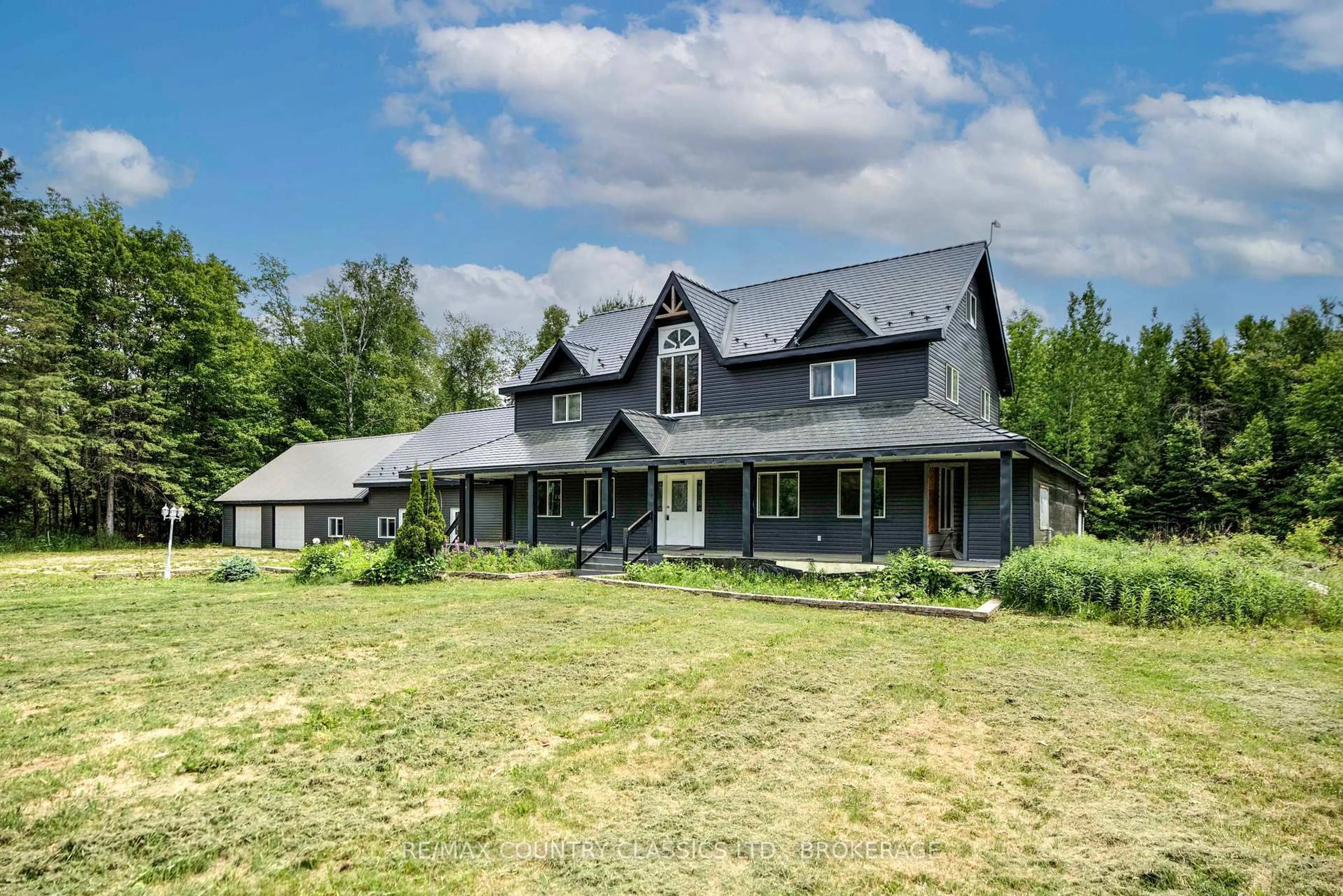 A pic from outside/outdoor area/front of a property/back of a property/a pic from drone, unknown for 1228 Road 506, Cloyne Ontario K0H 1K0