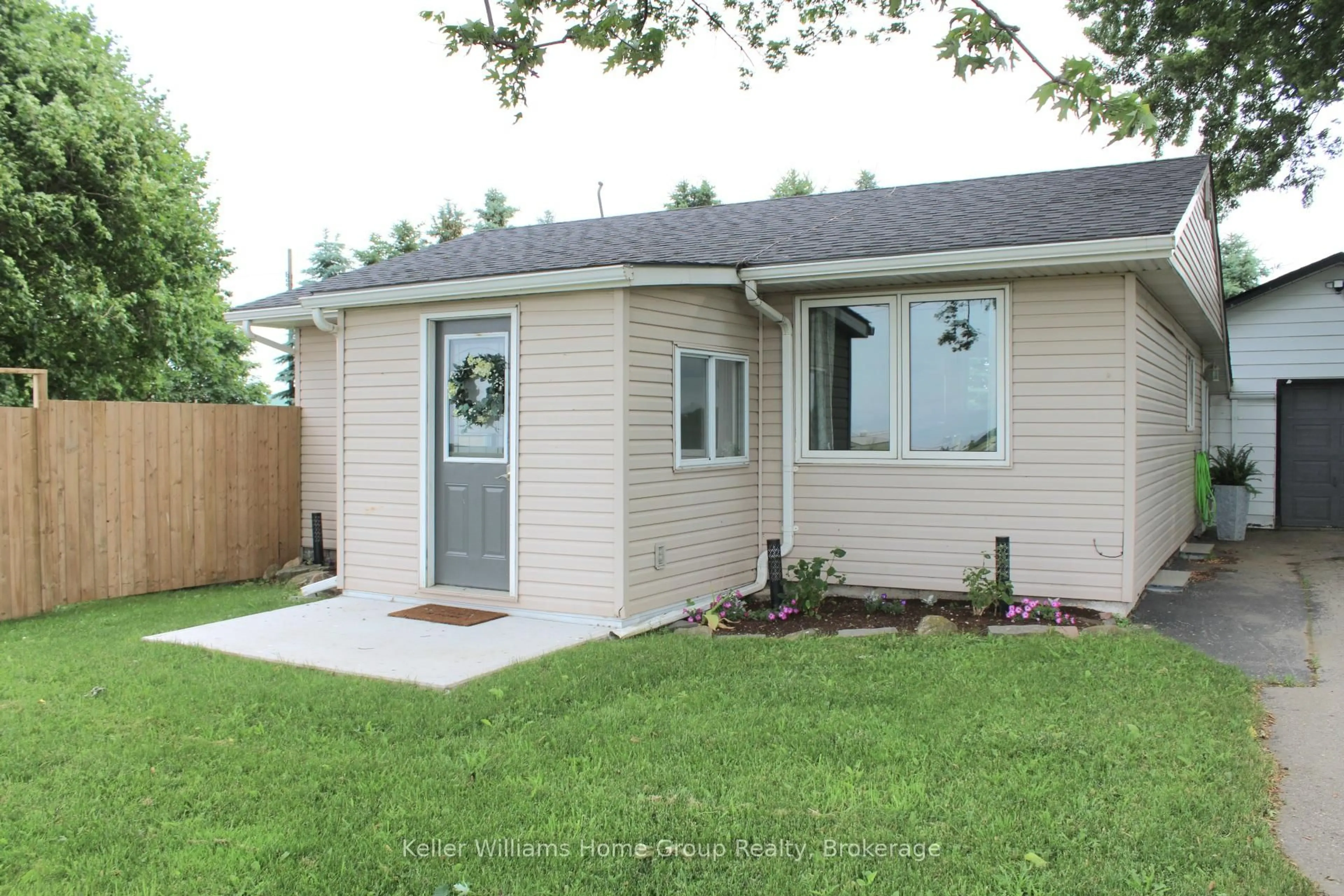 Home with vinyl exterior material, street for 7637 Wellington 7 Rd, Mapleton Ontario N0B 1A0
