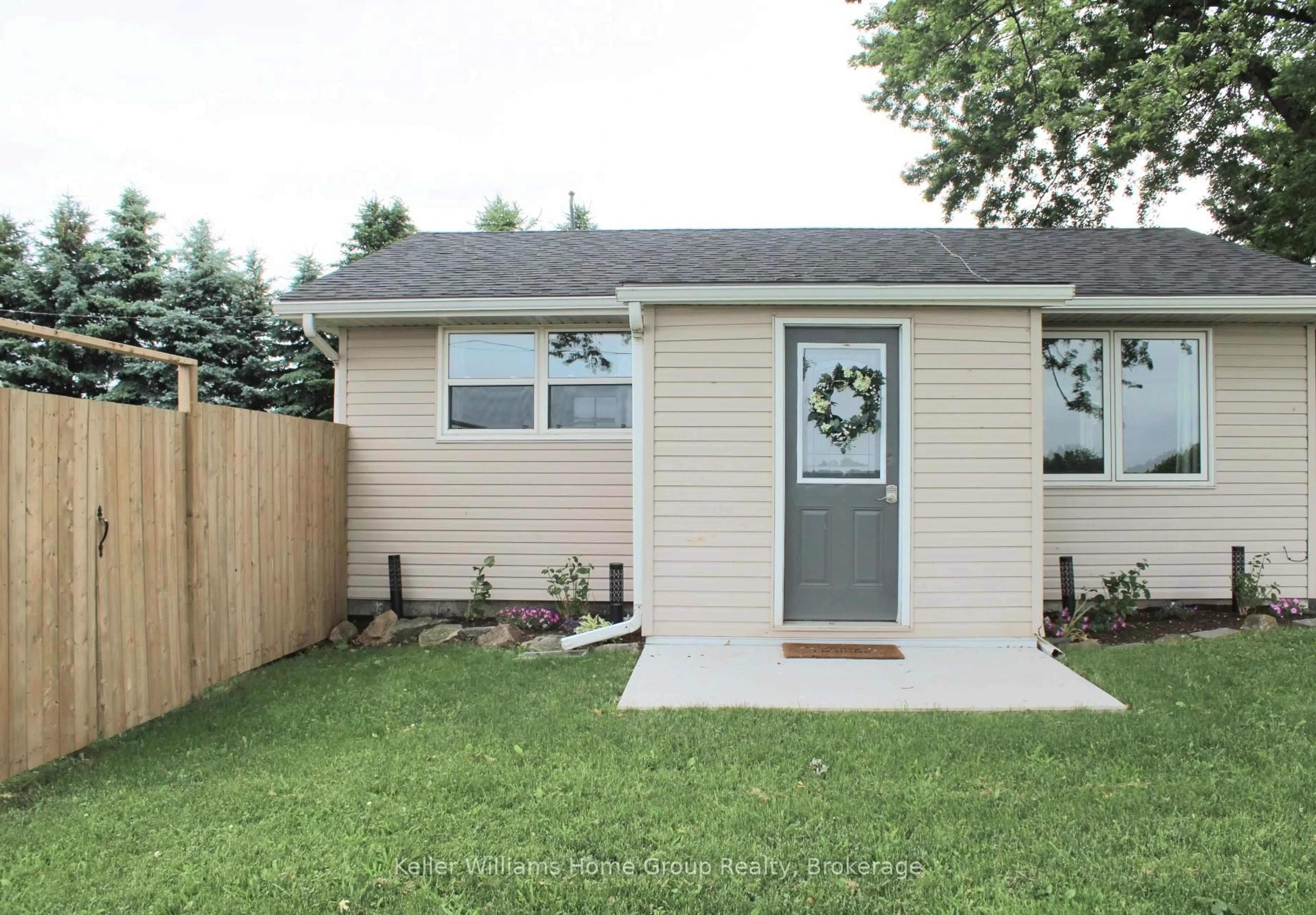 Home with vinyl exterior material, street for 7637 Wellington 7 Rd, Mapleton Ontario N0B 1A0