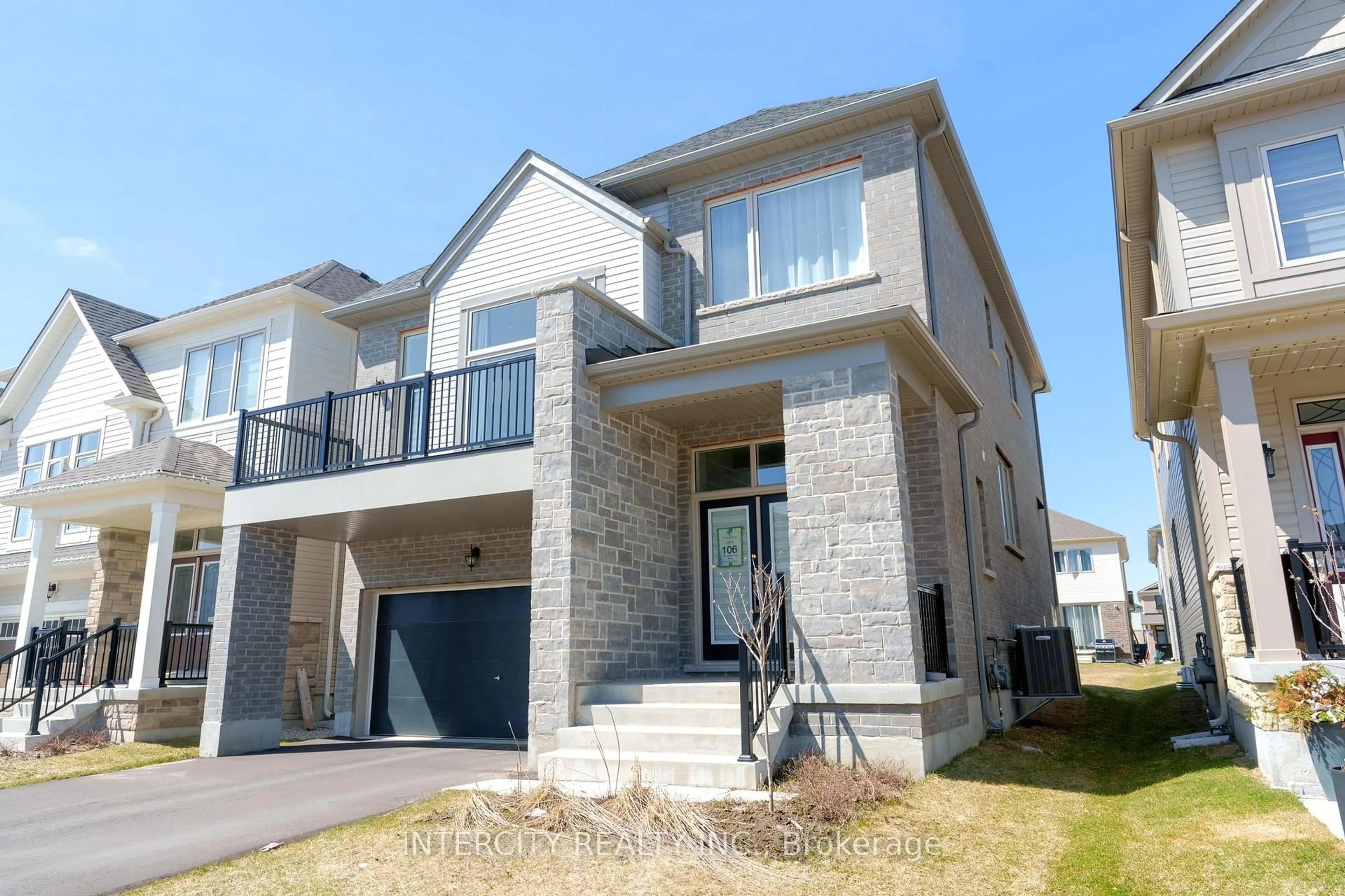Home with brick exterior material, street for 59 Harpin Way, Centre Wellington Ontario N1M 0H8
