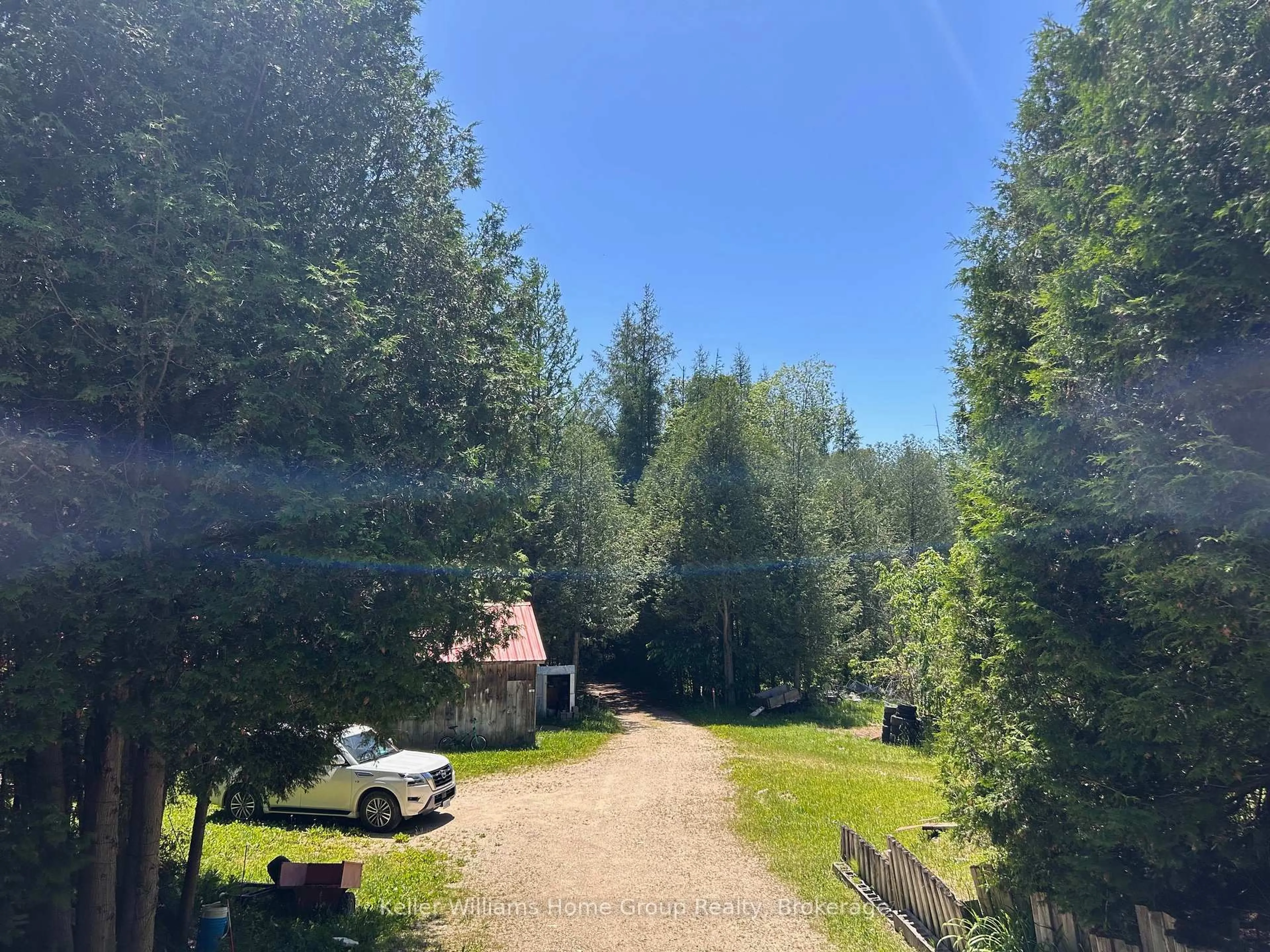 A pic from outside/outdoor area/front of a property/back of a property/a pic from drone, forest/trees view for 135431 9th Line, Grey Highlands Ontario N0C 1H0
