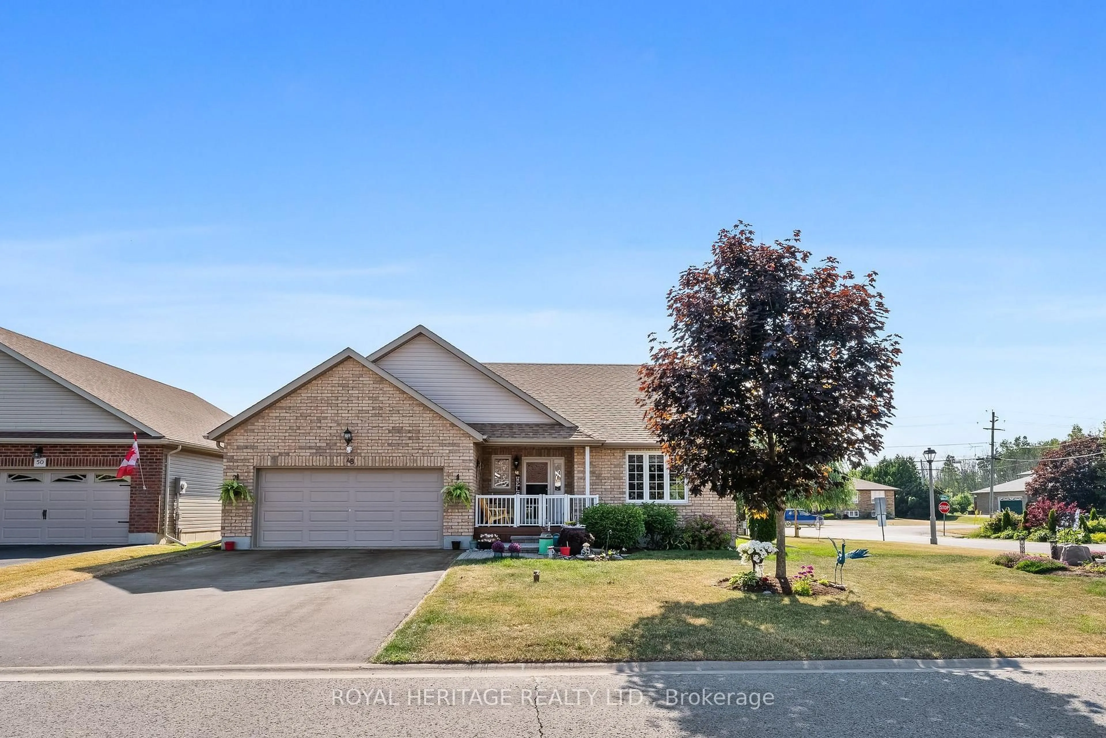 Home with vinyl exterior material, street for 48 Ward Dr, Brighton Ontario K0K 1H0