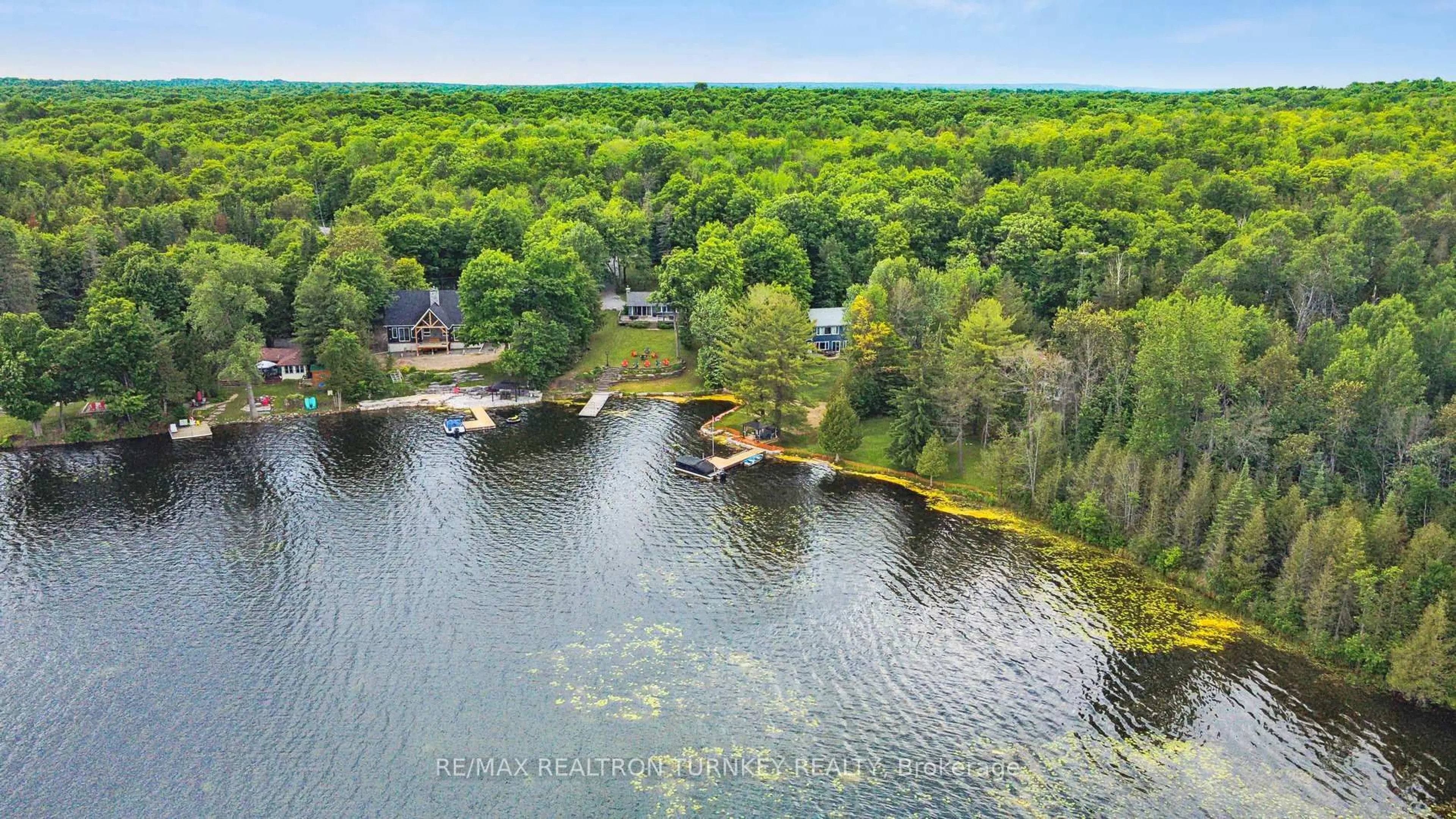 A pic from outside/outdoor area/front of a property/back of a property/a pic from drone, water/lake/river/ocean view for 310 Northern Ave, Trent Lakes Ontario K0M 1A0