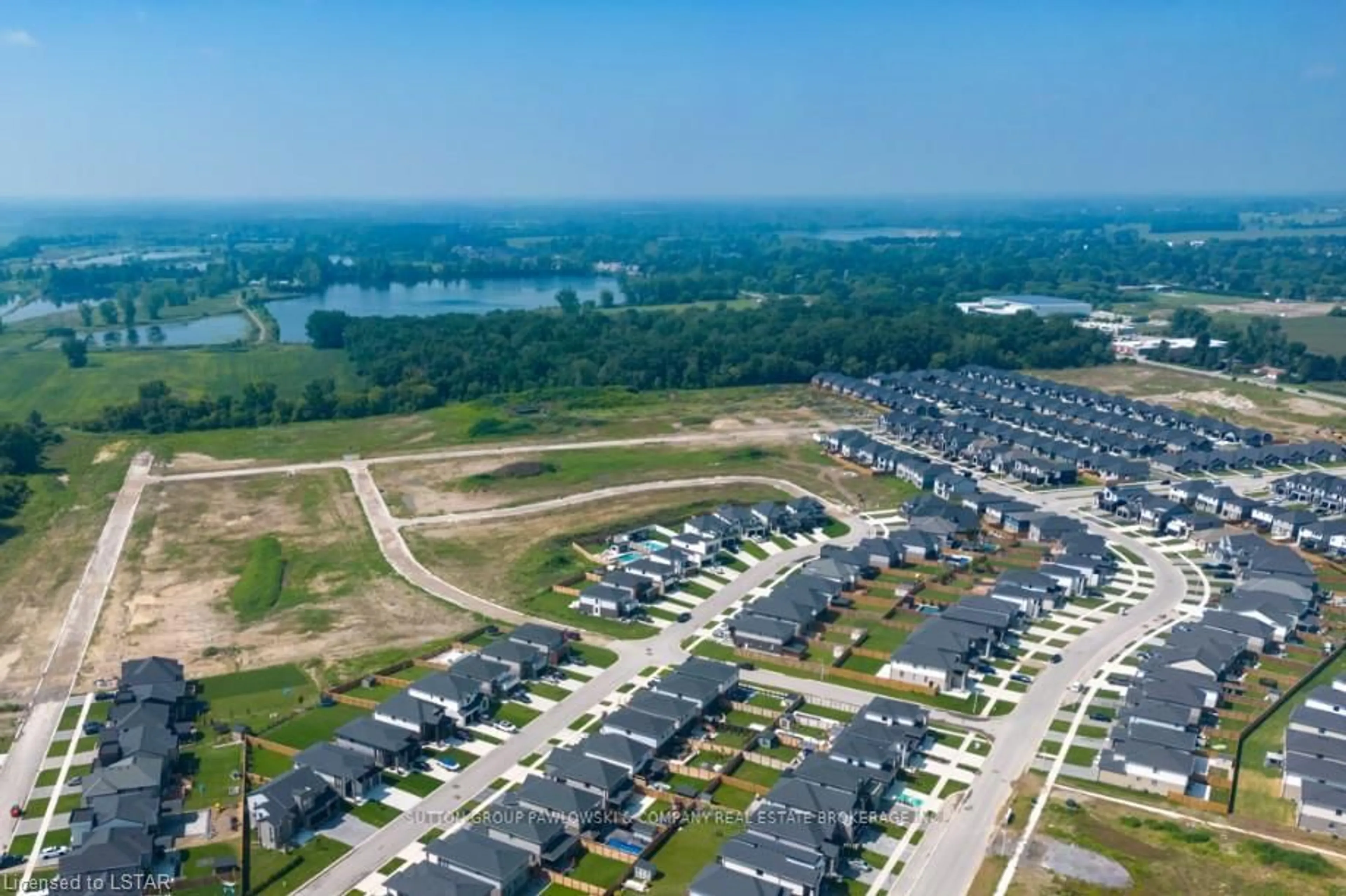A pic from outside/outdoor area/front of a property/back of a property/a pic from drone, water/lake/river/ocean view for 60 ALLISTER Dr #Lot#100, Middlesex Centre Ontario N0L 1R0