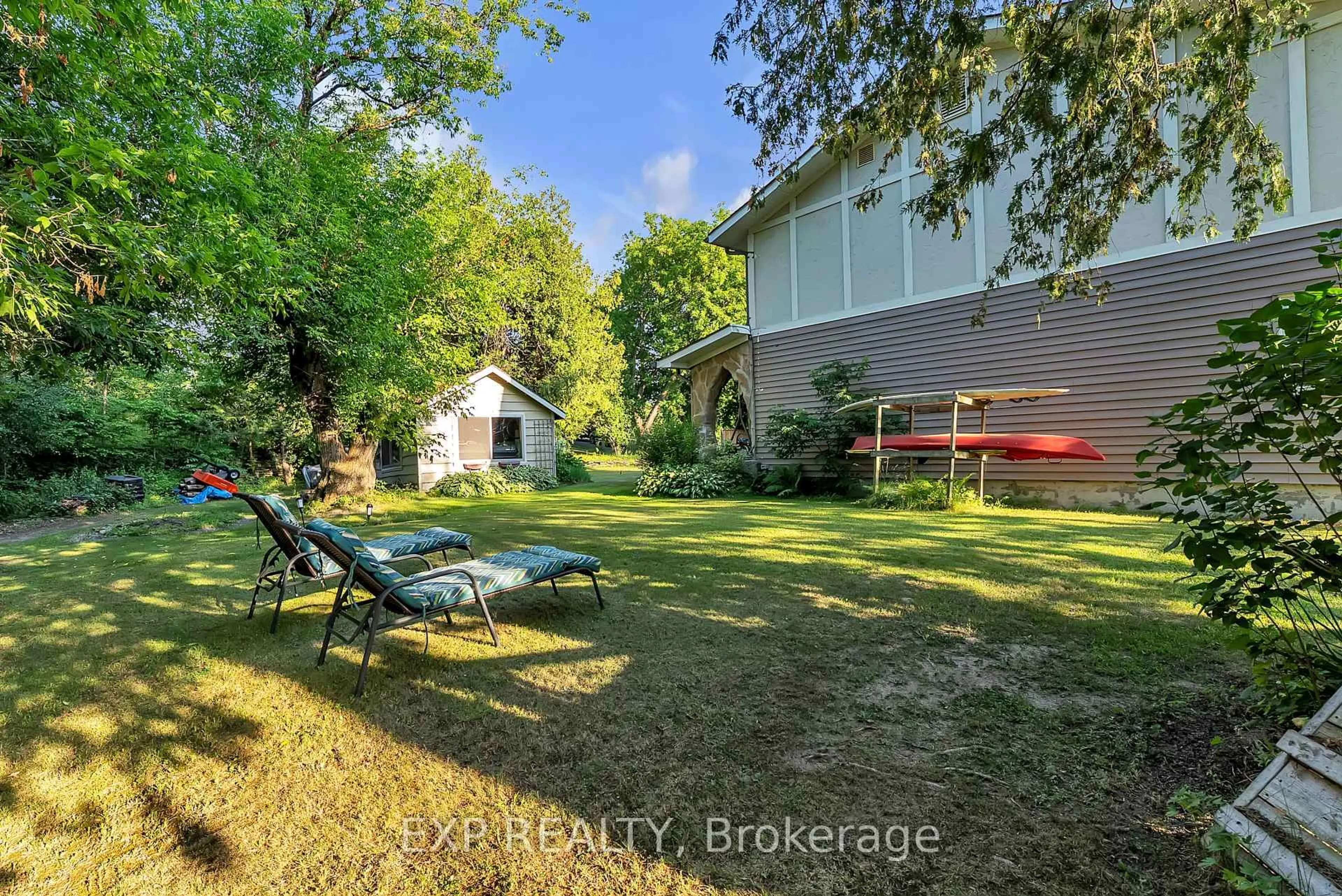 A pic from outside/outdoor area/front of a property/back of a property/a pic from drone, water/lake/river/ocean view for 587 Scuttlehole Rd, Belleville Ontario K0K 2V0