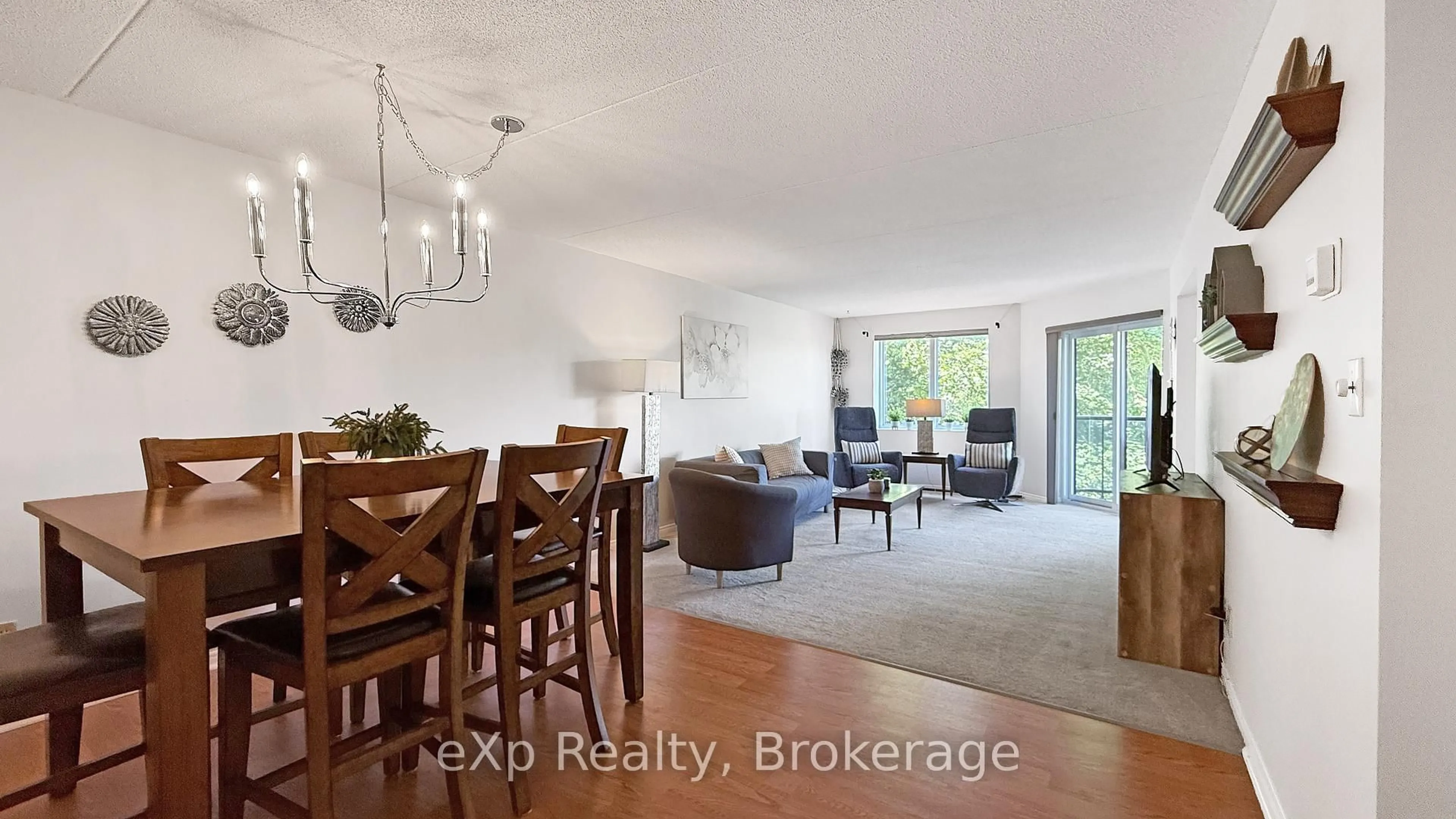 Living room with furniture, wood/laminate floor for 536 11th Ave #404, Hanover Ontario N4N 2S4
