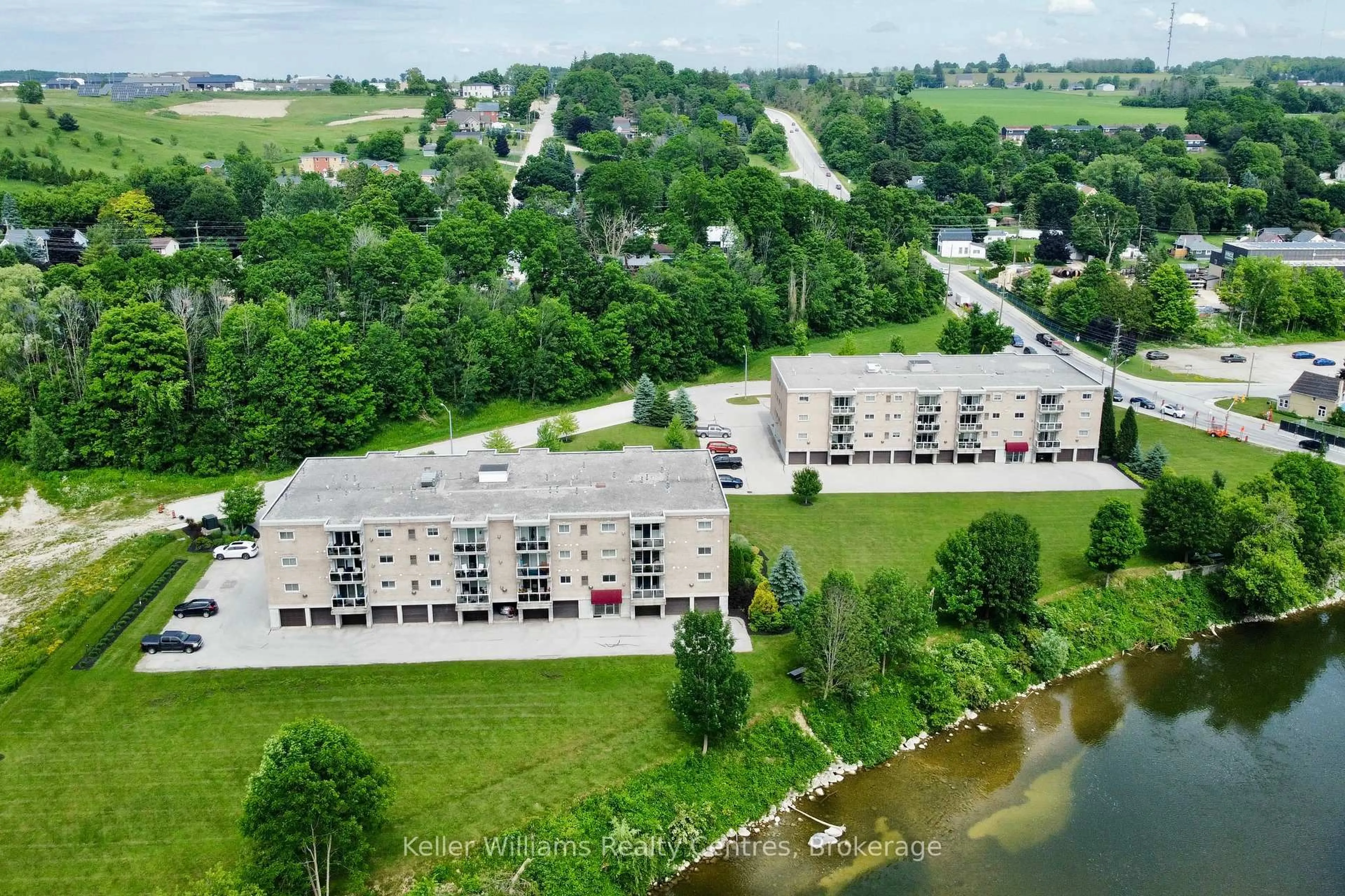 A pic from outside/outdoor area/front of a property/back of a property/a pic from drone, water/lake/river/ocean view for 85 William St #307, Brockton Ontario N0G 2V0