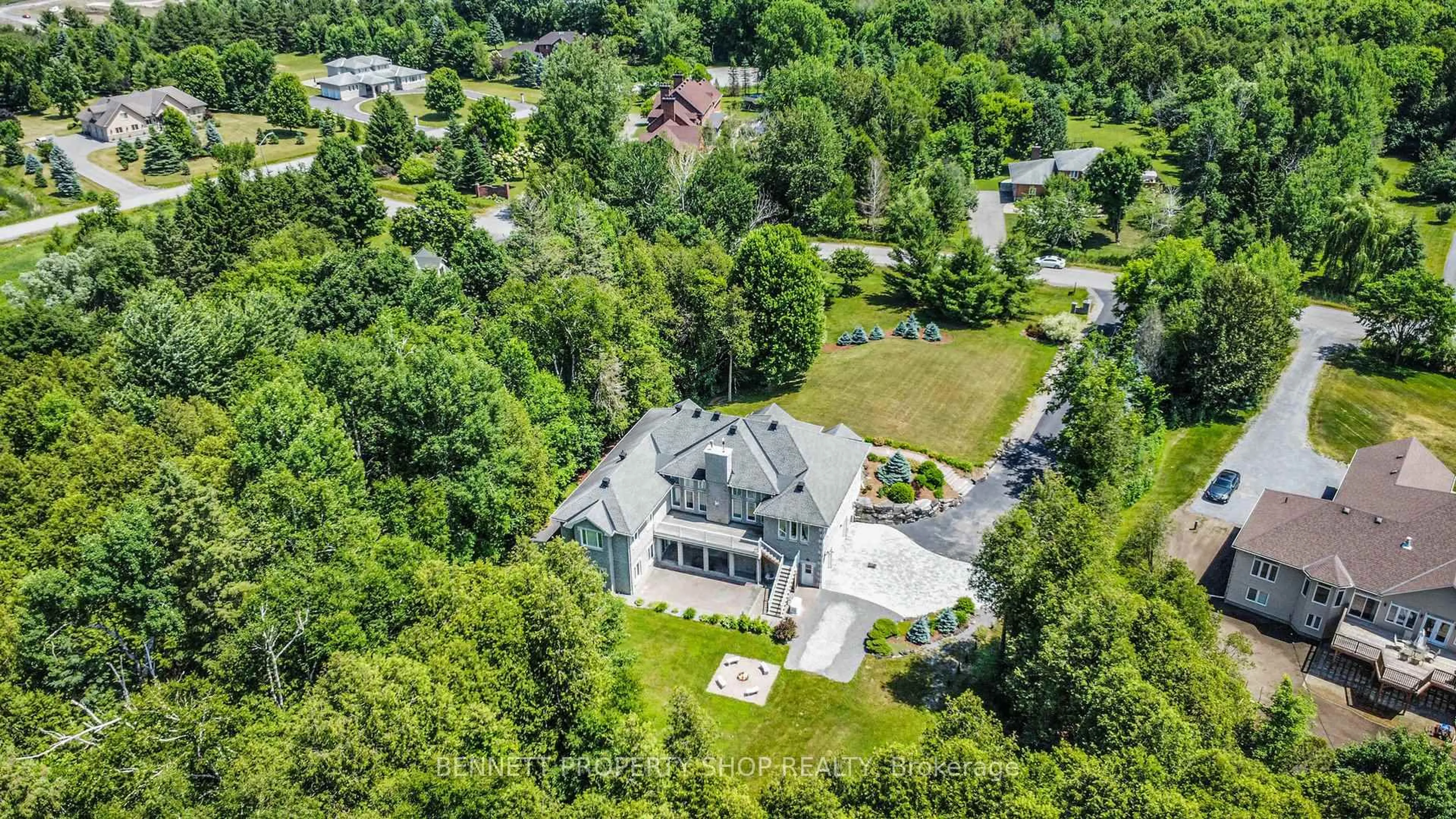 A pic from outside/outdoor area/front of a property/back of a property/a pic from drone, unknown for 17 Panandrick View Dr, Ottawa Ontario K2W 1A5