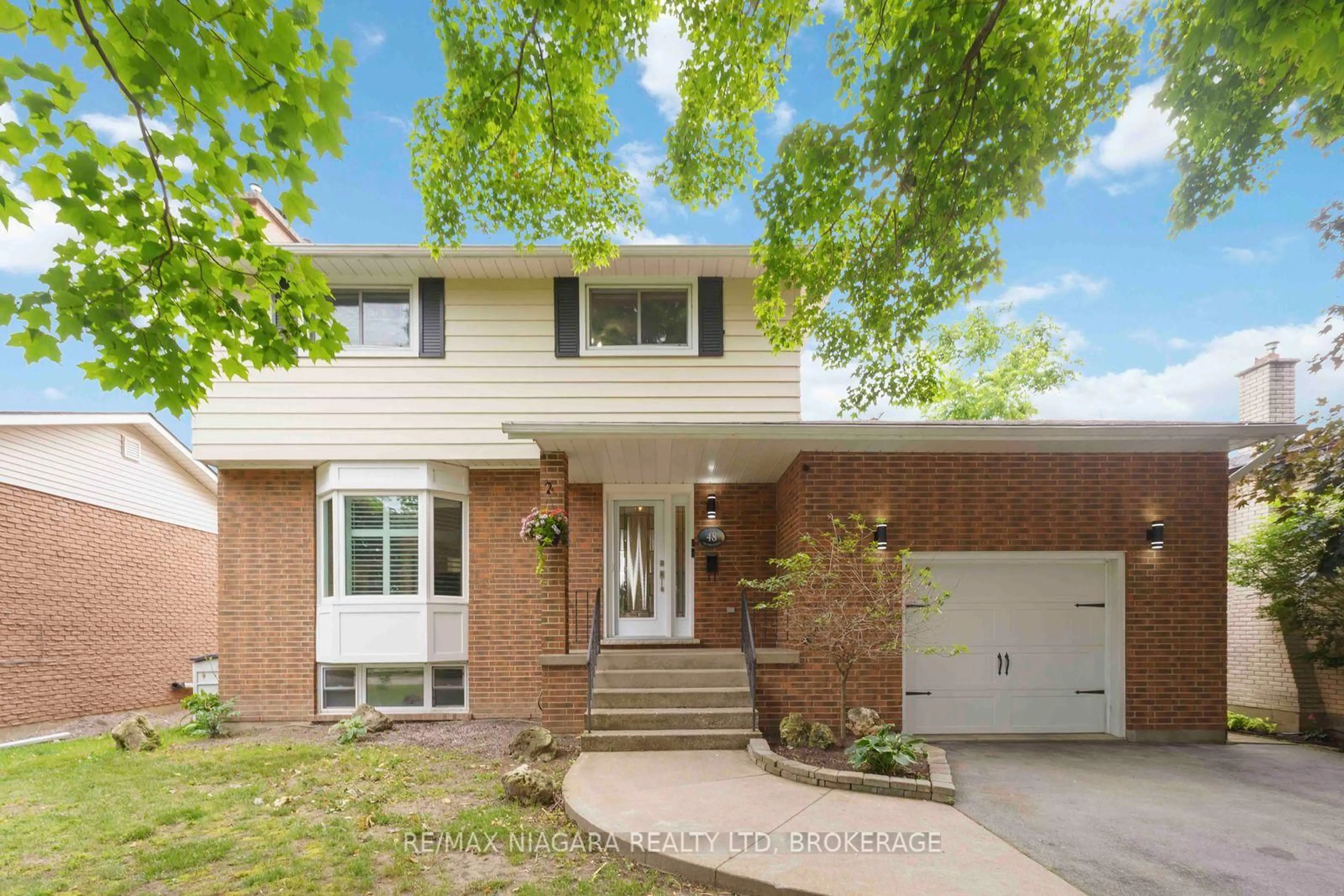 Home with brick exterior material, street for 48 Michael Dr, Port Colborne Ontario L3K 3C2