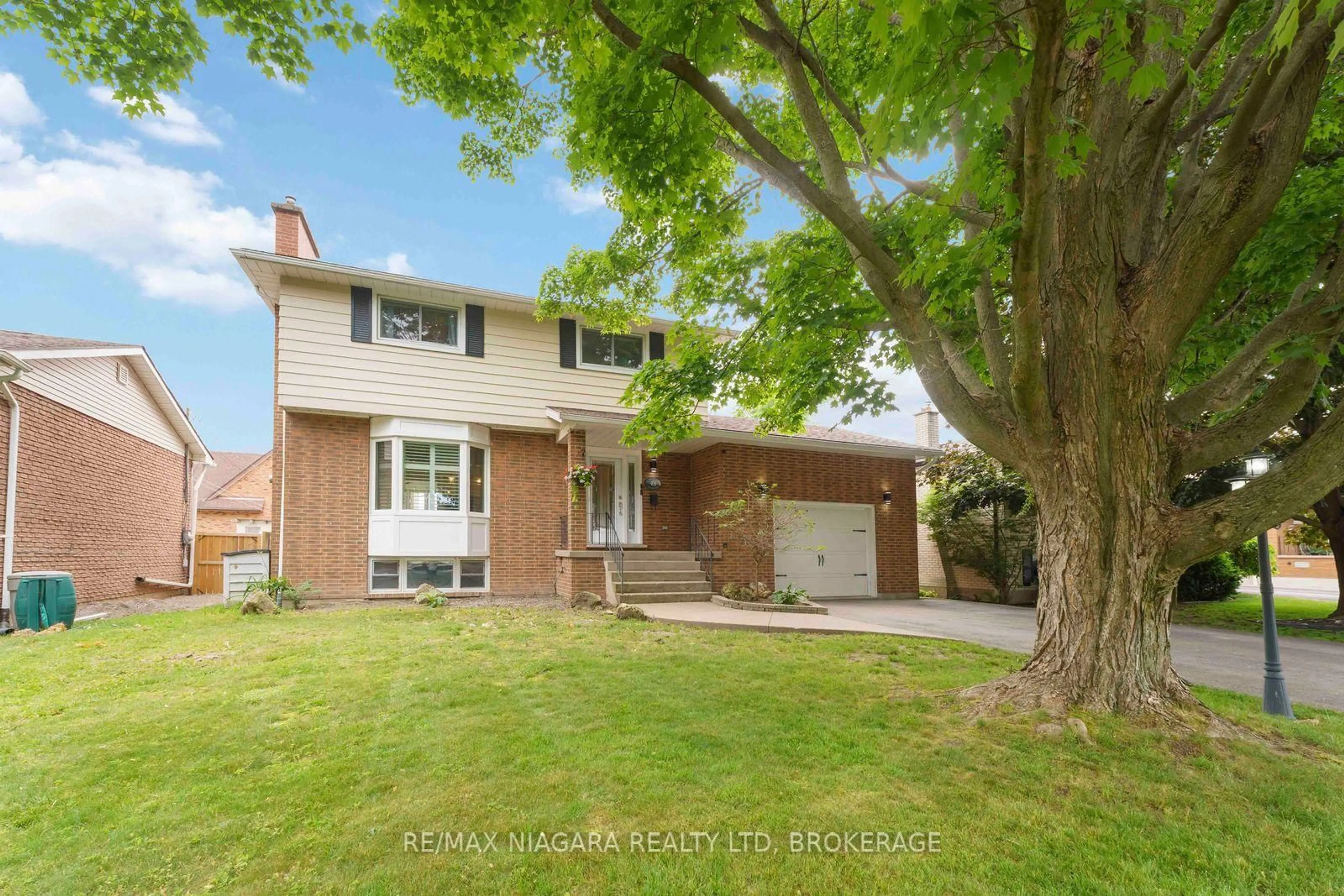 Home with brick exterior material, street for 48 Michael Dr, Port Colborne Ontario L3K 3C2