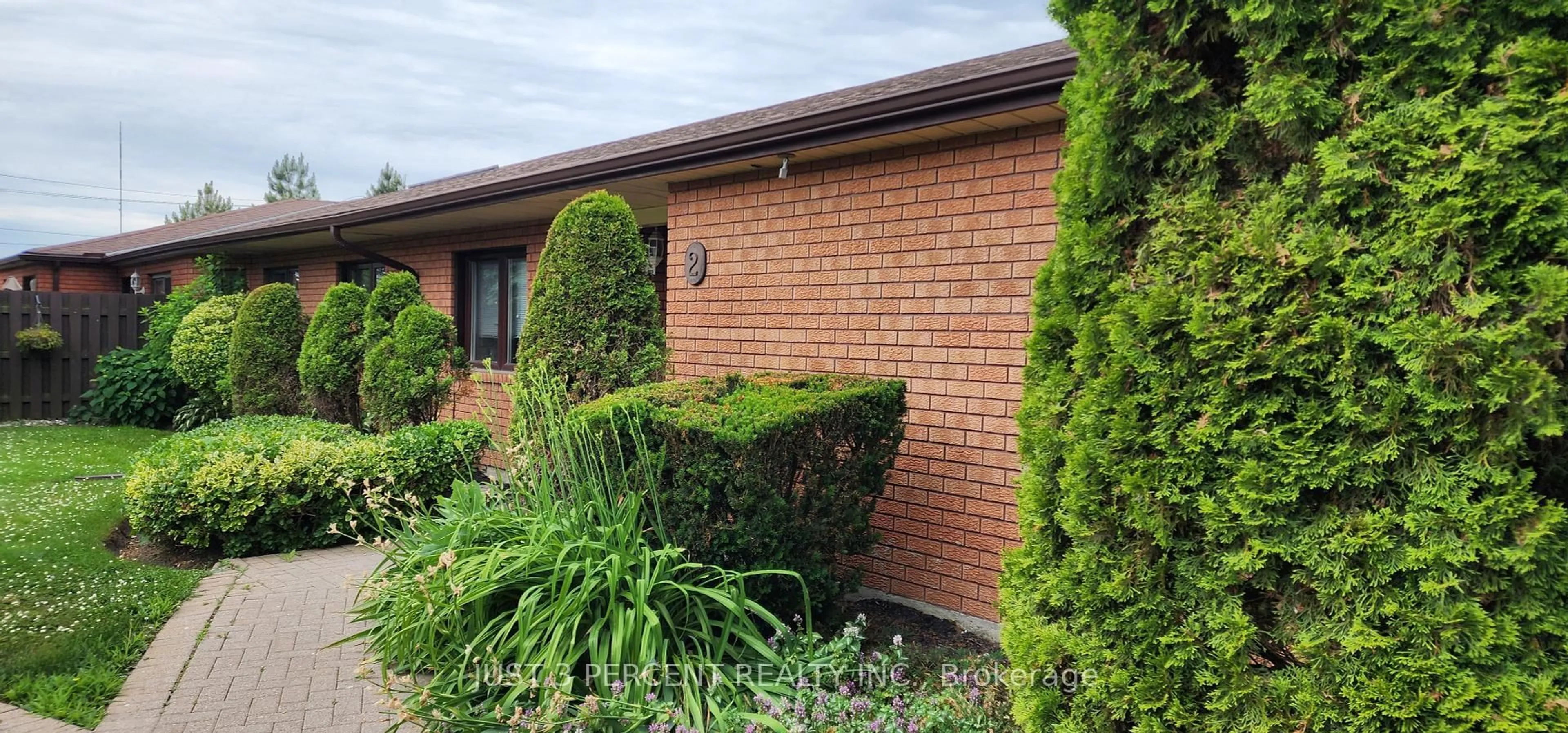 Home with brick exterior material, street for 36 Champlain Cres #26, Peterborough North Ontario K9L 1T1