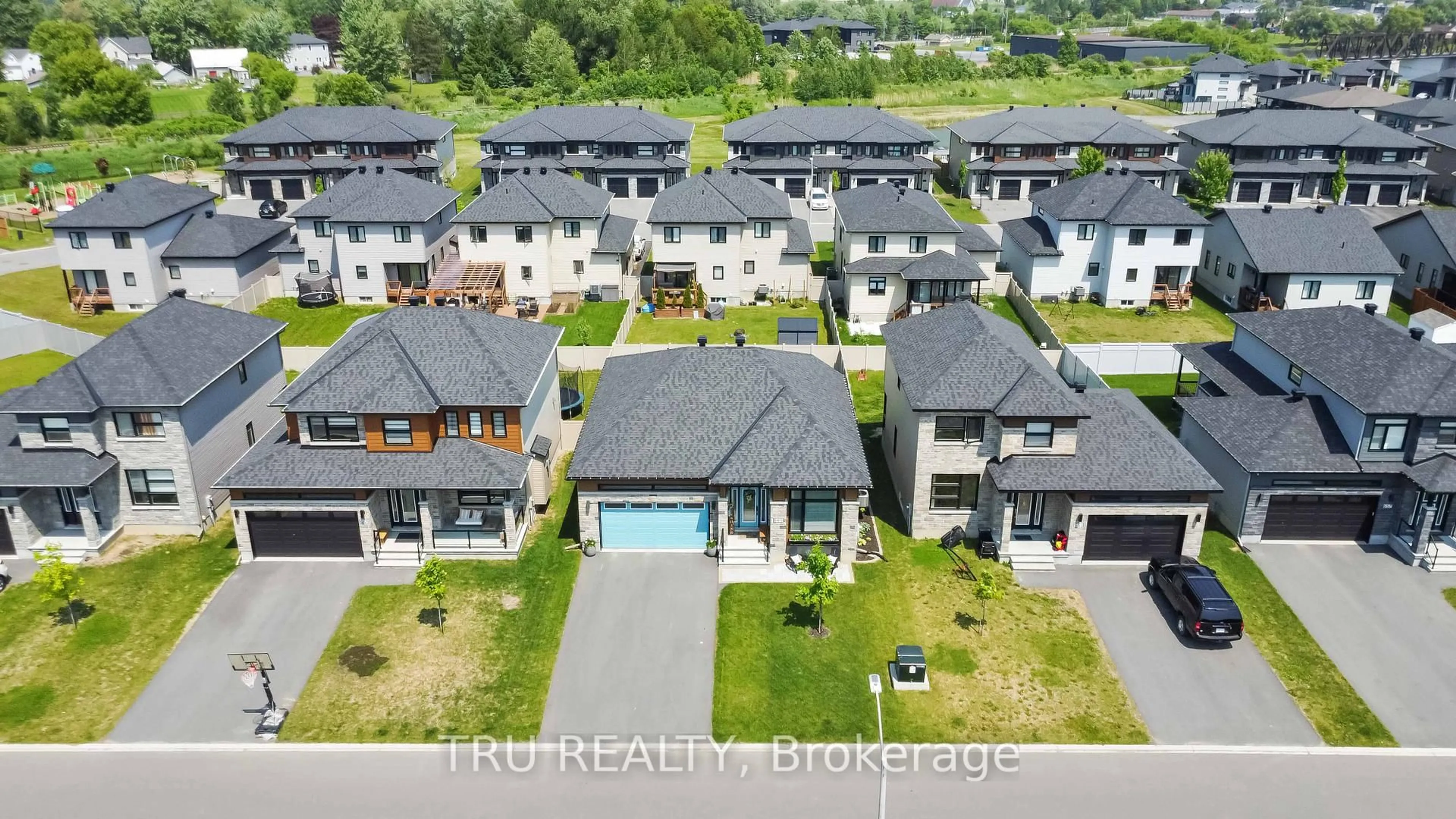 A pic from outside/outdoor area/front of a property/back of a property/a pic from drone, street for 665 Conservation St, Casselman Ontario K0A 1M0