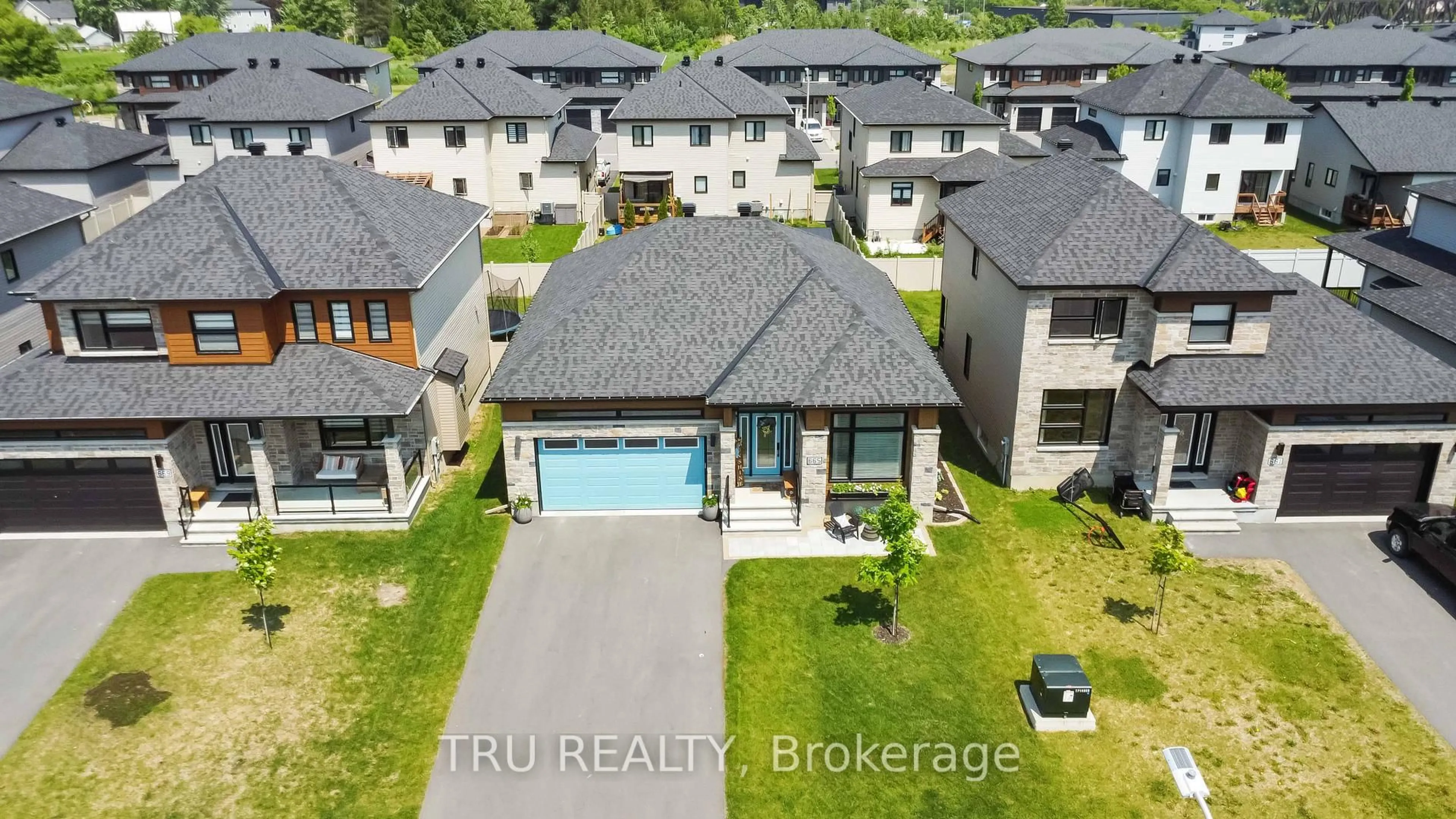 A pic from outside/outdoor area/front of a property/back of a property/a pic from drone, street for 665 Conservation St, Casselman Ontario K0A 1M0