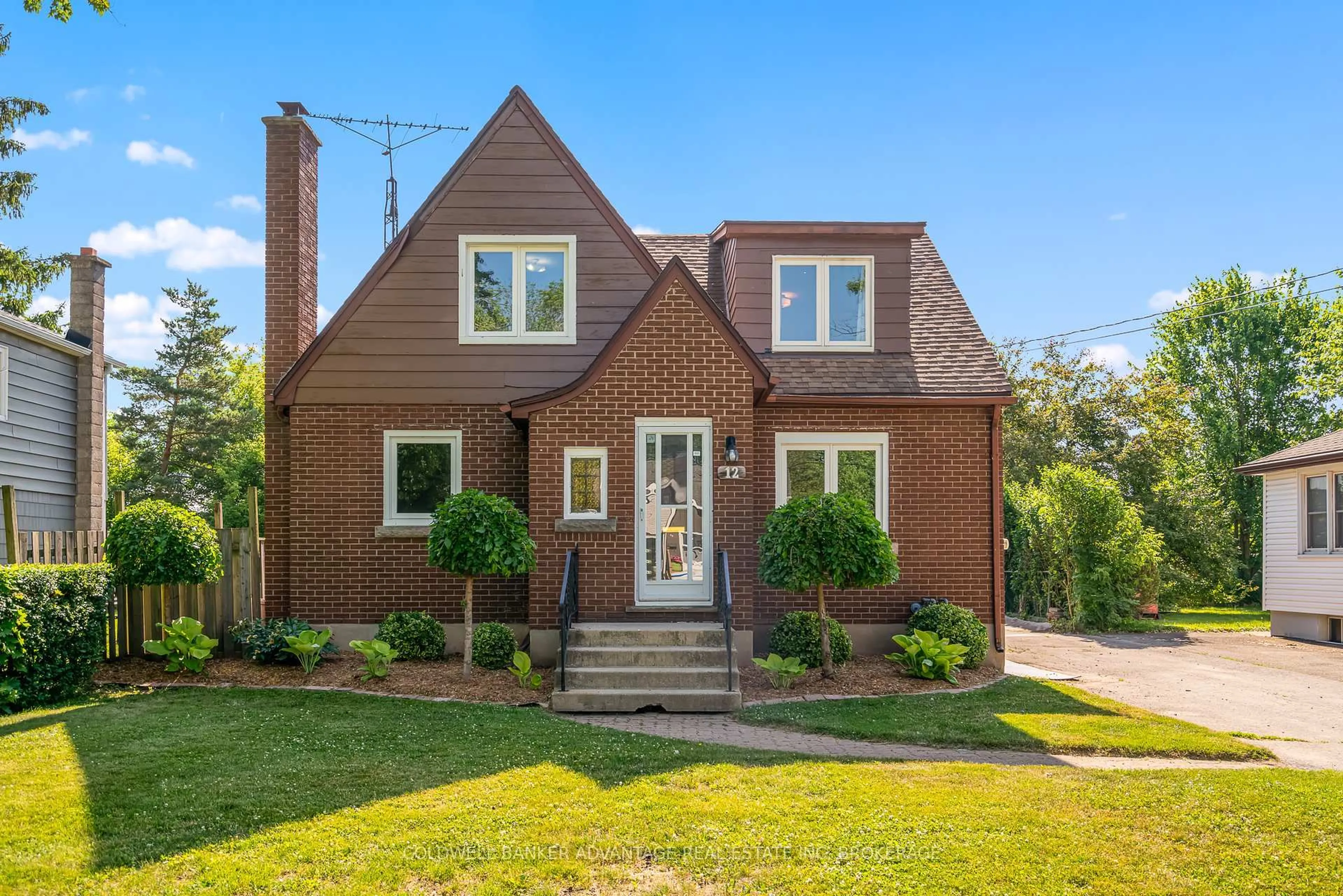 Home with brick exterior material, street for 12 Carlton Ave, Welland Ontario L3C 1P9