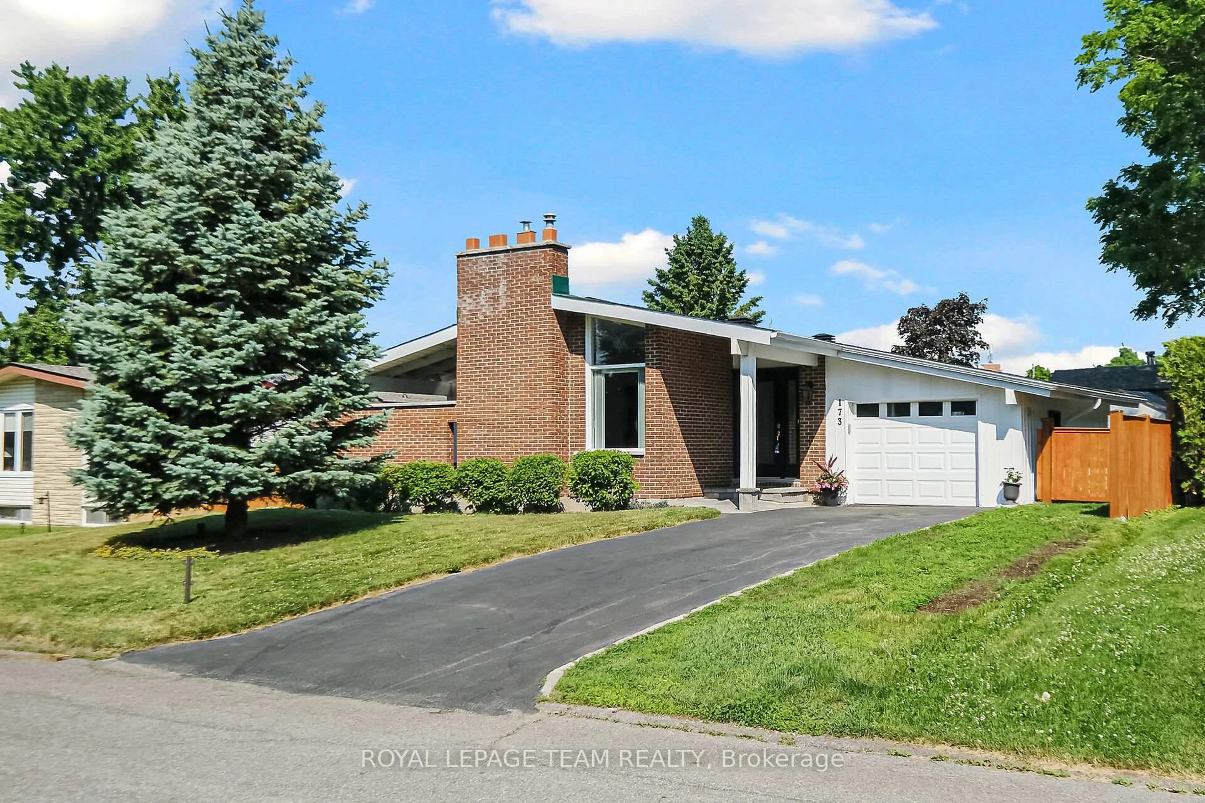 Home with brick exterior material, street for 173 Banning Rd, Ottawa Ontario K2L 1C5