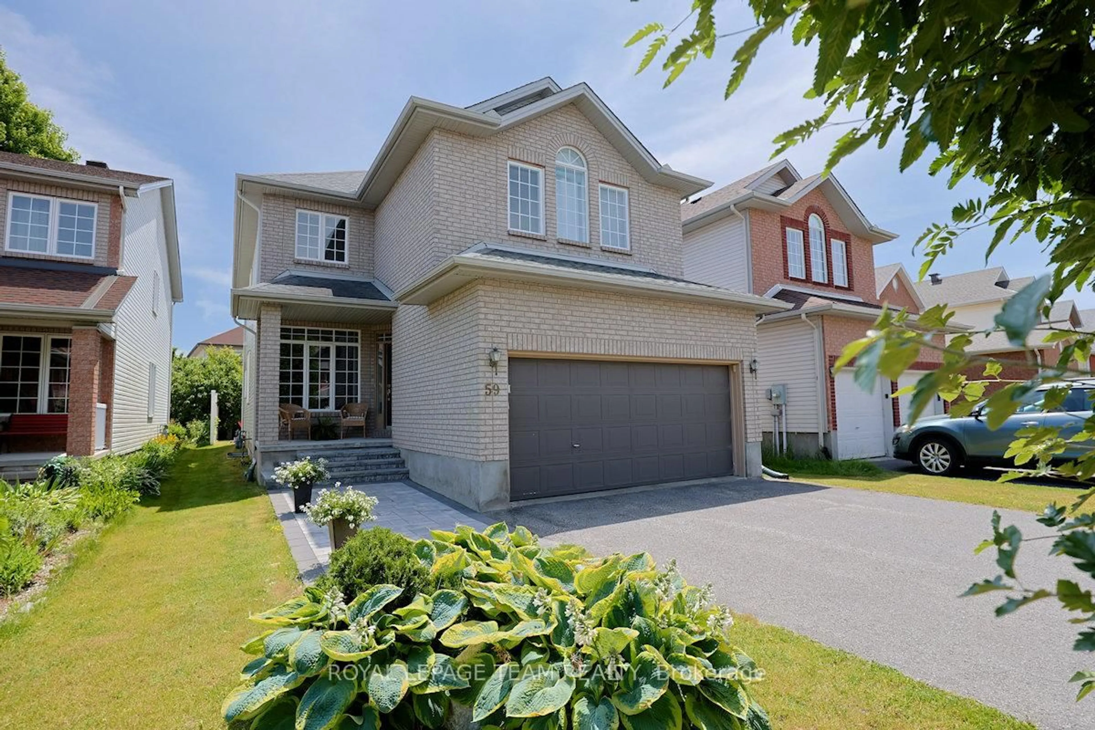 Home with brick exterior material, street for 59 Maricona Way, Ottawa Ontario K2T 1H2