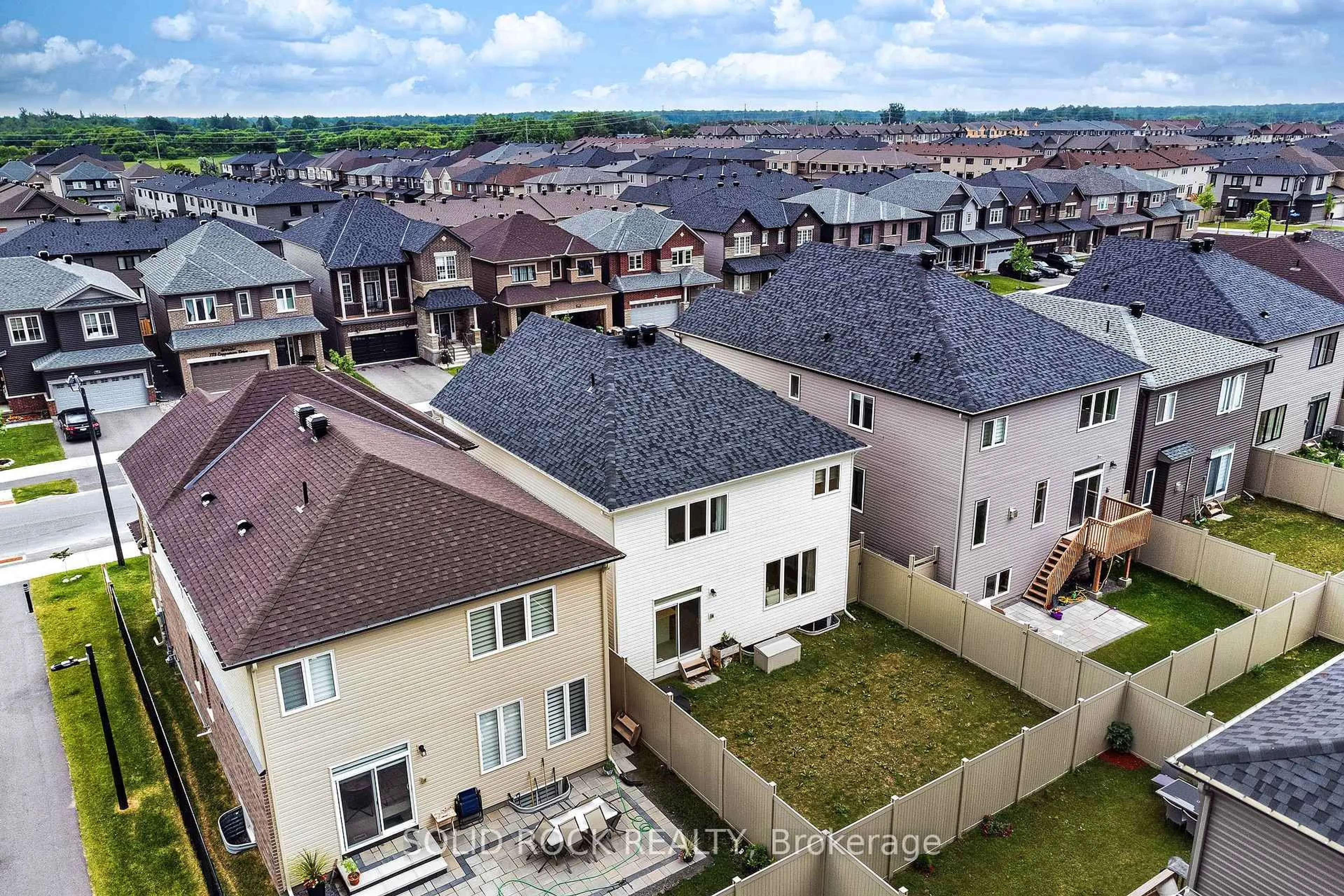 A pic from outside/outdoor area/front of a property/back of a property/a pic from drone, city buildings view from balcony for 772 Cappamore Dr, Ottawa Ontario K2J 6V6